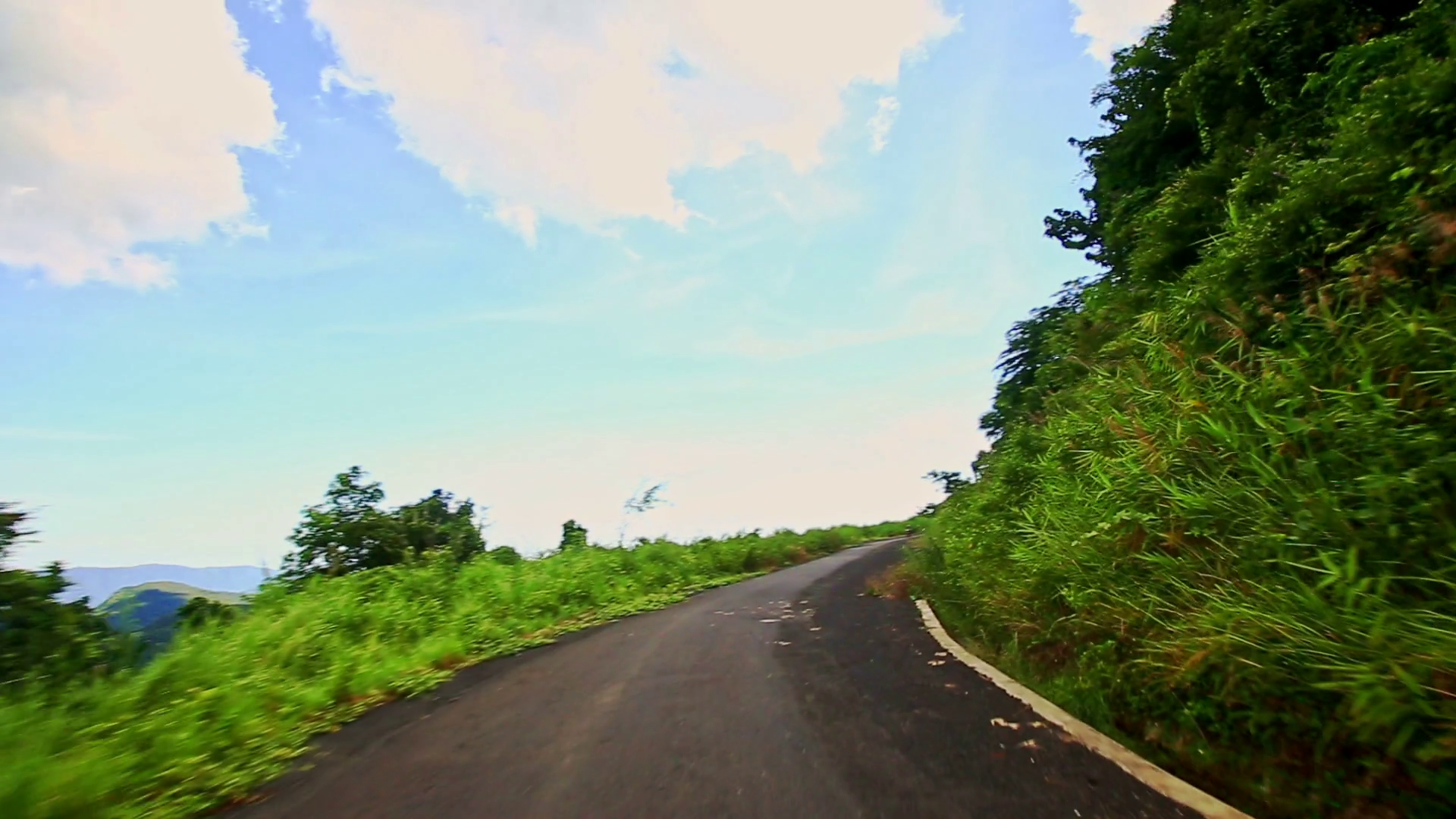 Motion along Country Curvy Road among Hilly Landscape under Sky ...