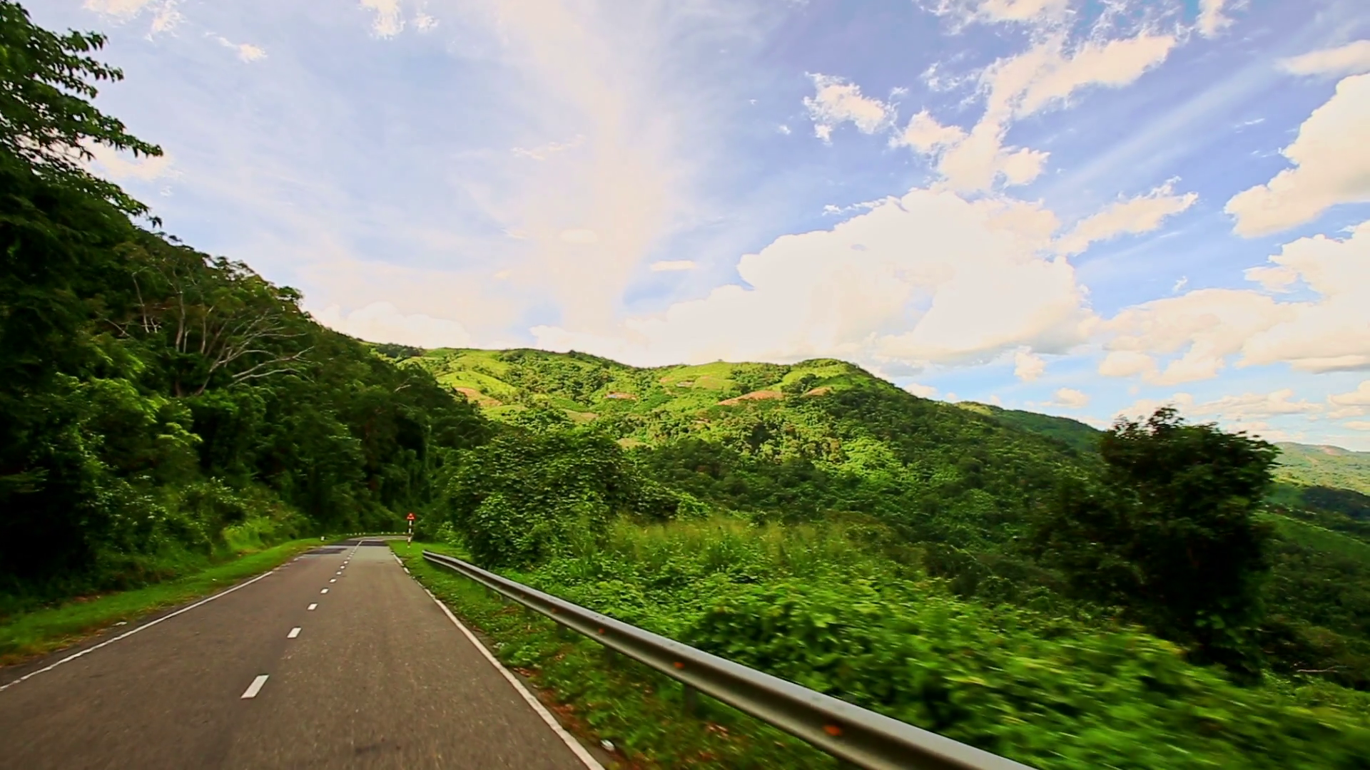 Motion along Country Curvy Road among Hilly Landscape under Sky ...