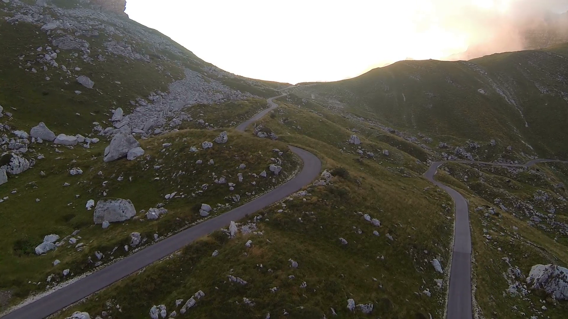 Aerial shot of curvy mountain road at sunset. Stock Video Footage ...