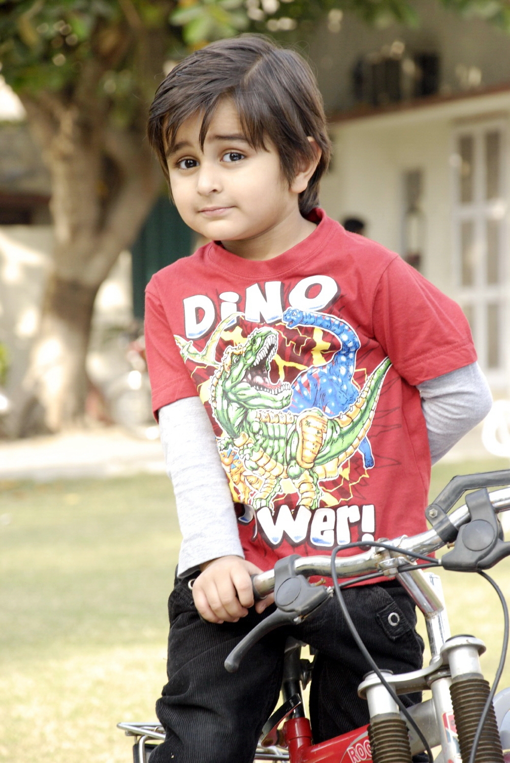 Cute kid with bicycle photo