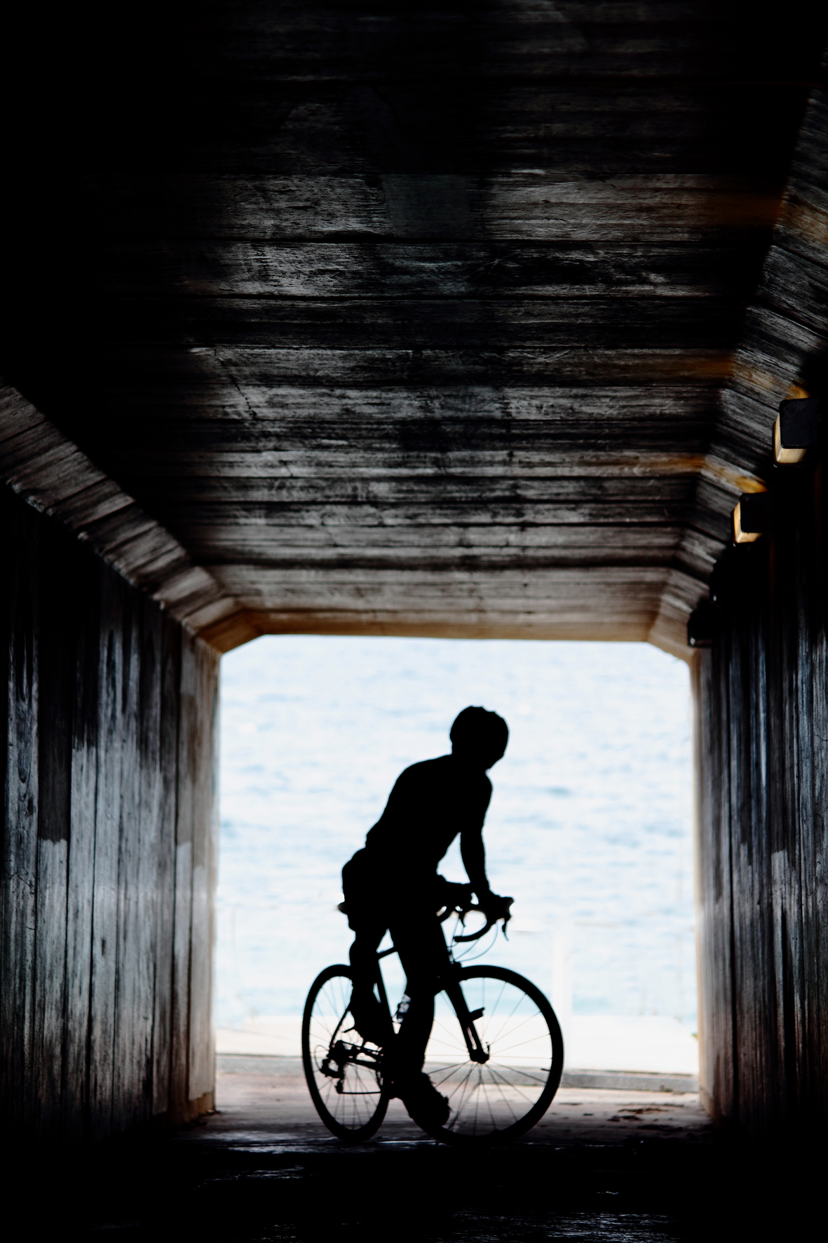 Cyclist in tunnel photo