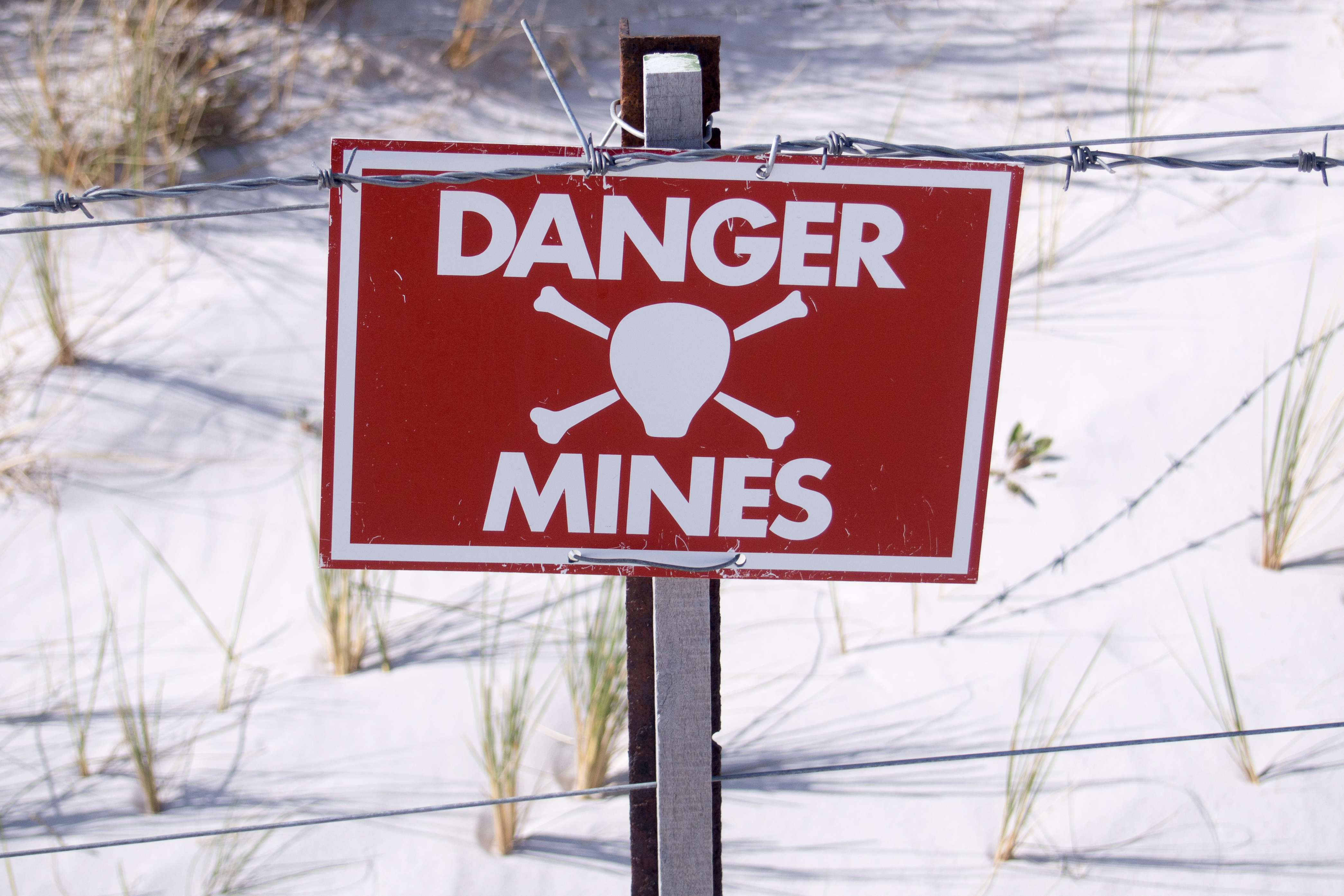Danger - land mine sign in the falklands photo
