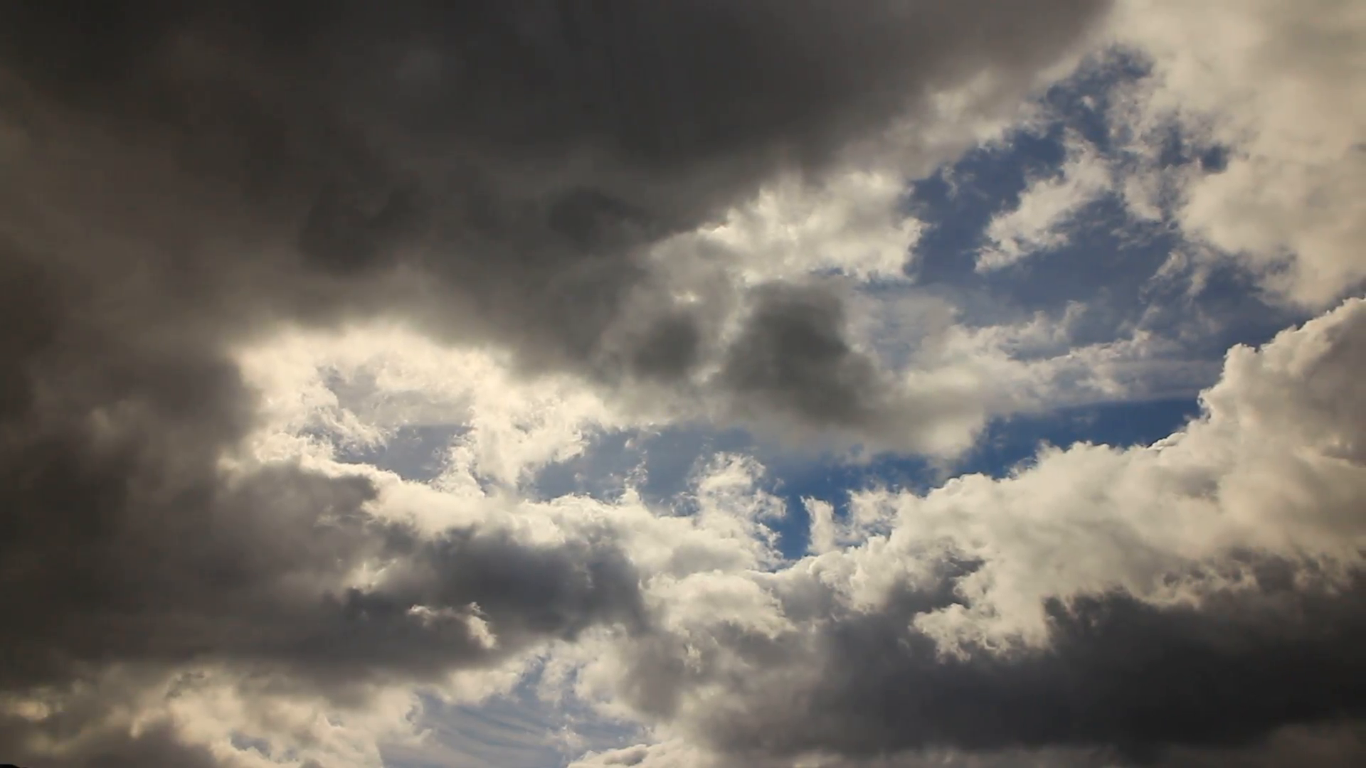 Cloudscape. Blue sky with fluffy dark clouds HD Stock Video Footage ...