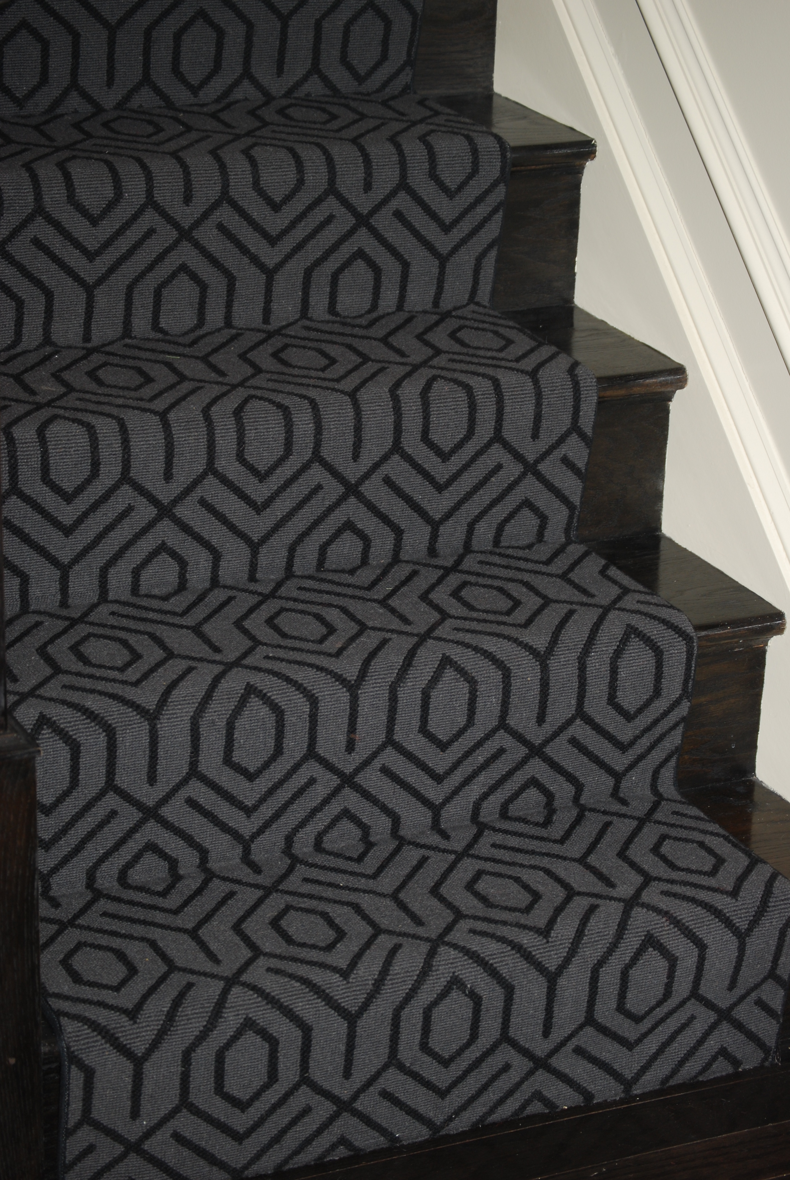 Stair runner w/ geometric; dark stain, dark rug | Entryway ...