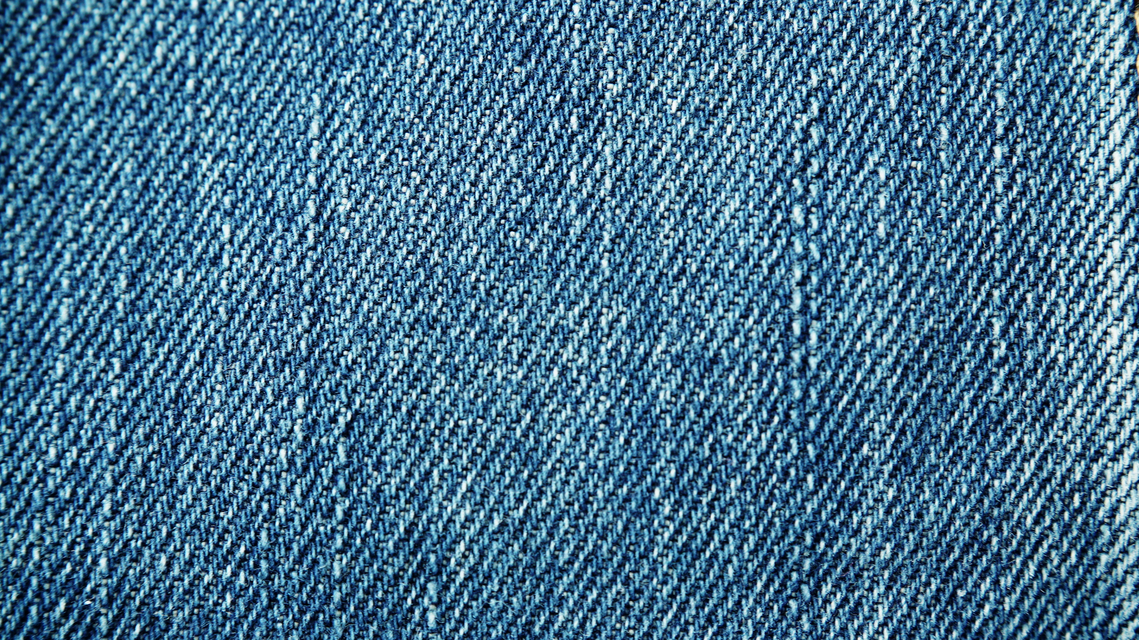 Closeup detail of blue denim jeans texture background 4K ~ Video ...