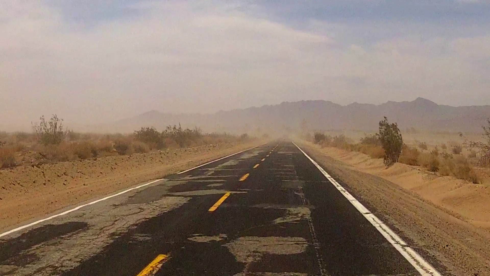 View Of Car Driving Old Desert Road Through Blowing Sand Storm Stock ...