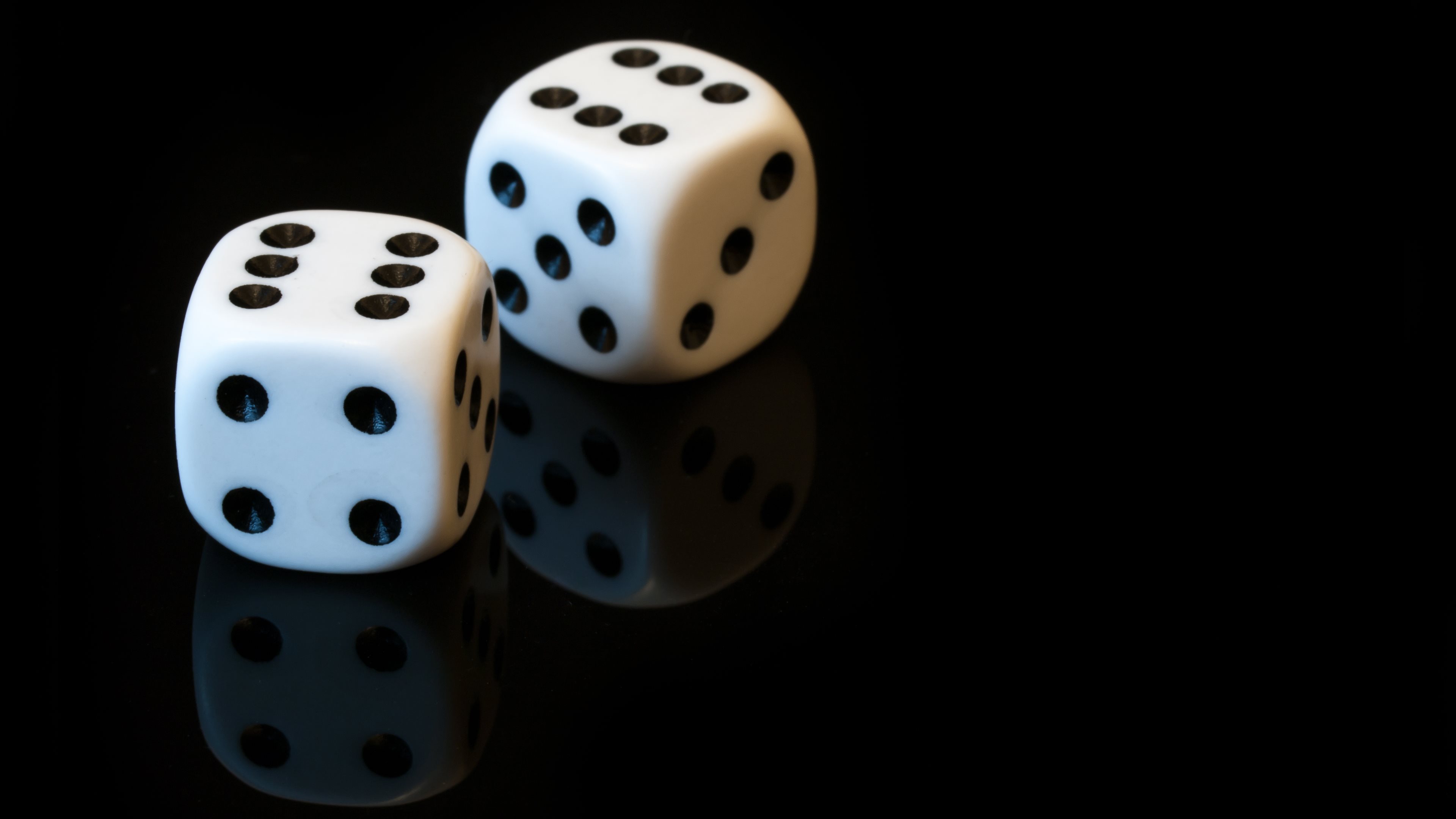 Two dice rolling 11, shot against a white background Stock Photo - Alamy