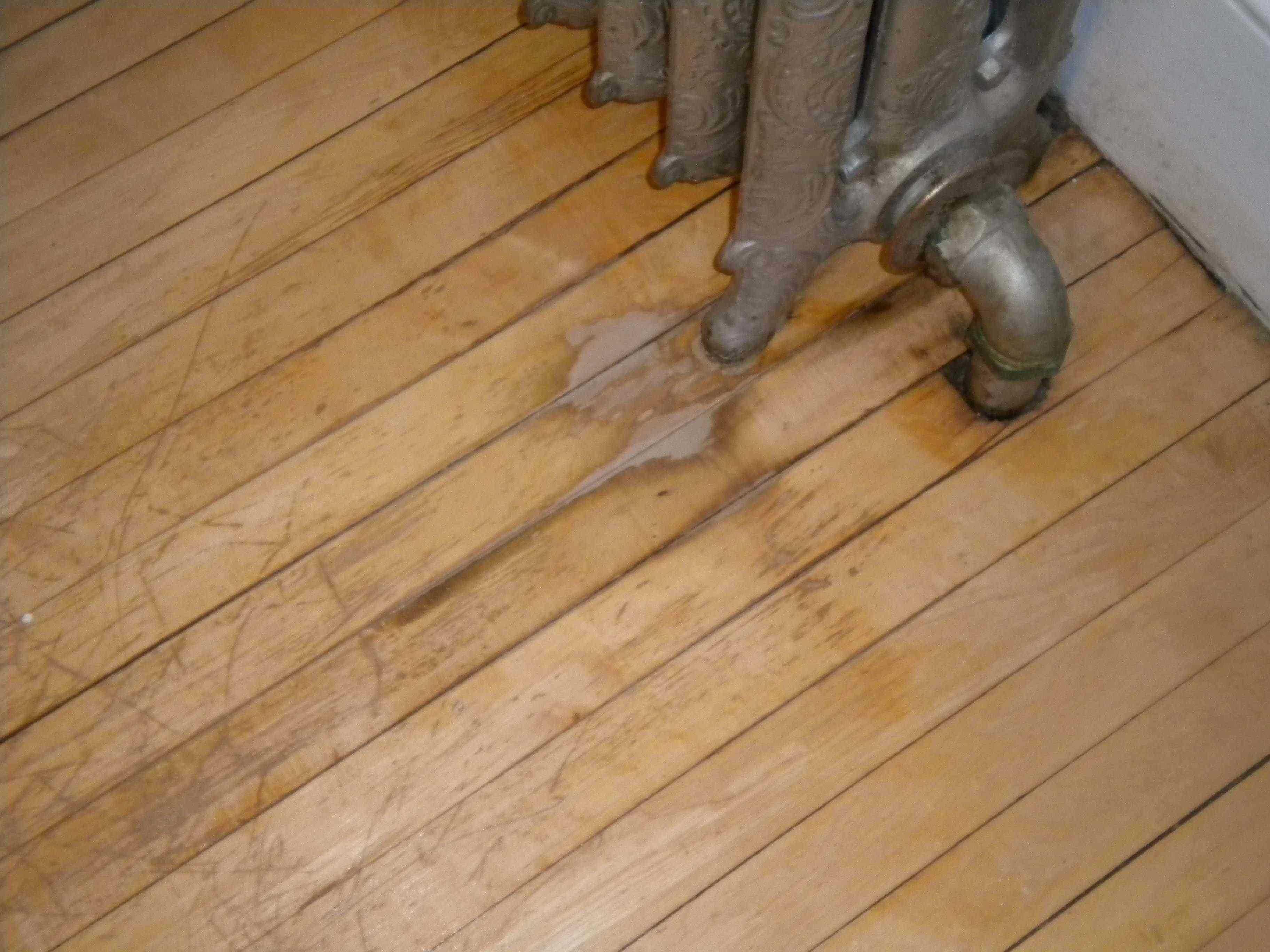 A spot of discoloration in wood floor | The Home Depot Community