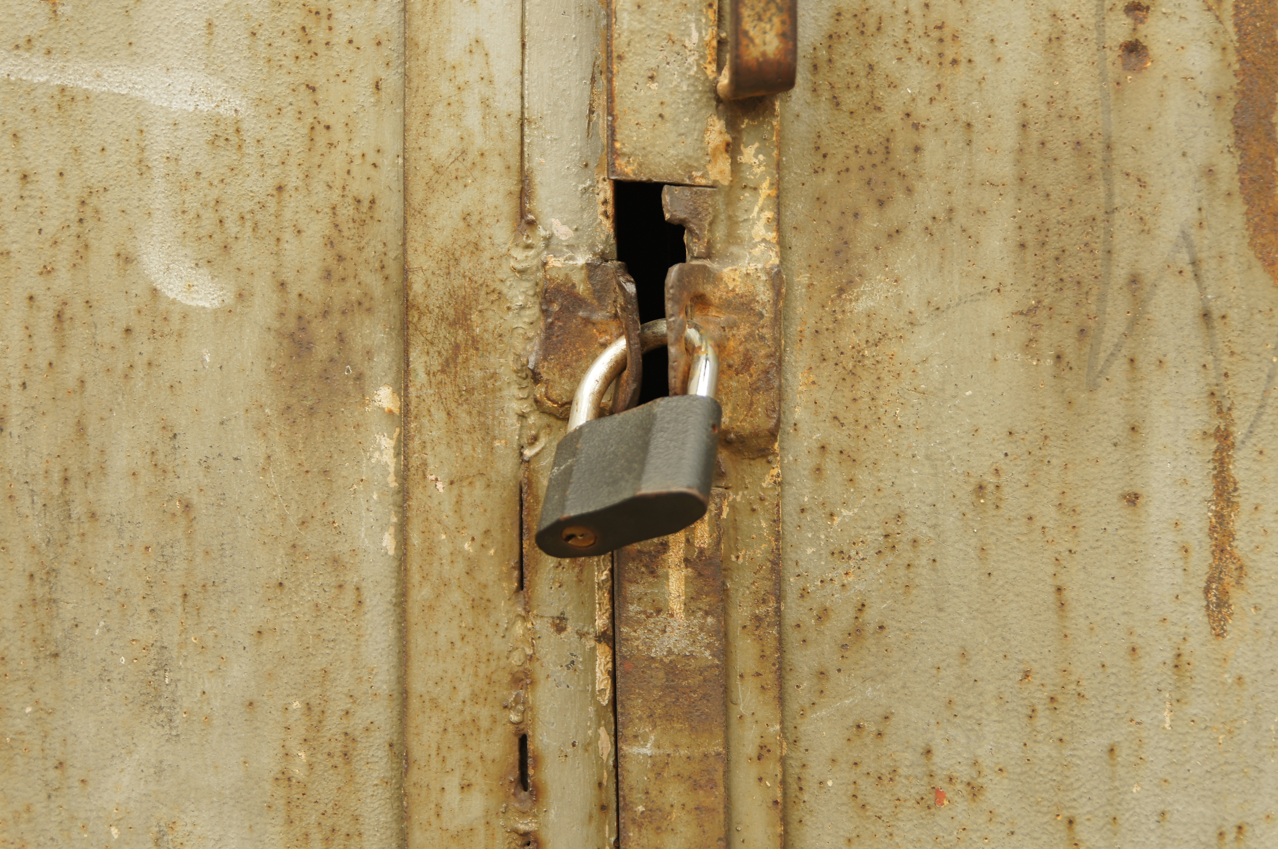 Padlock on old metal door - Our Great Photos