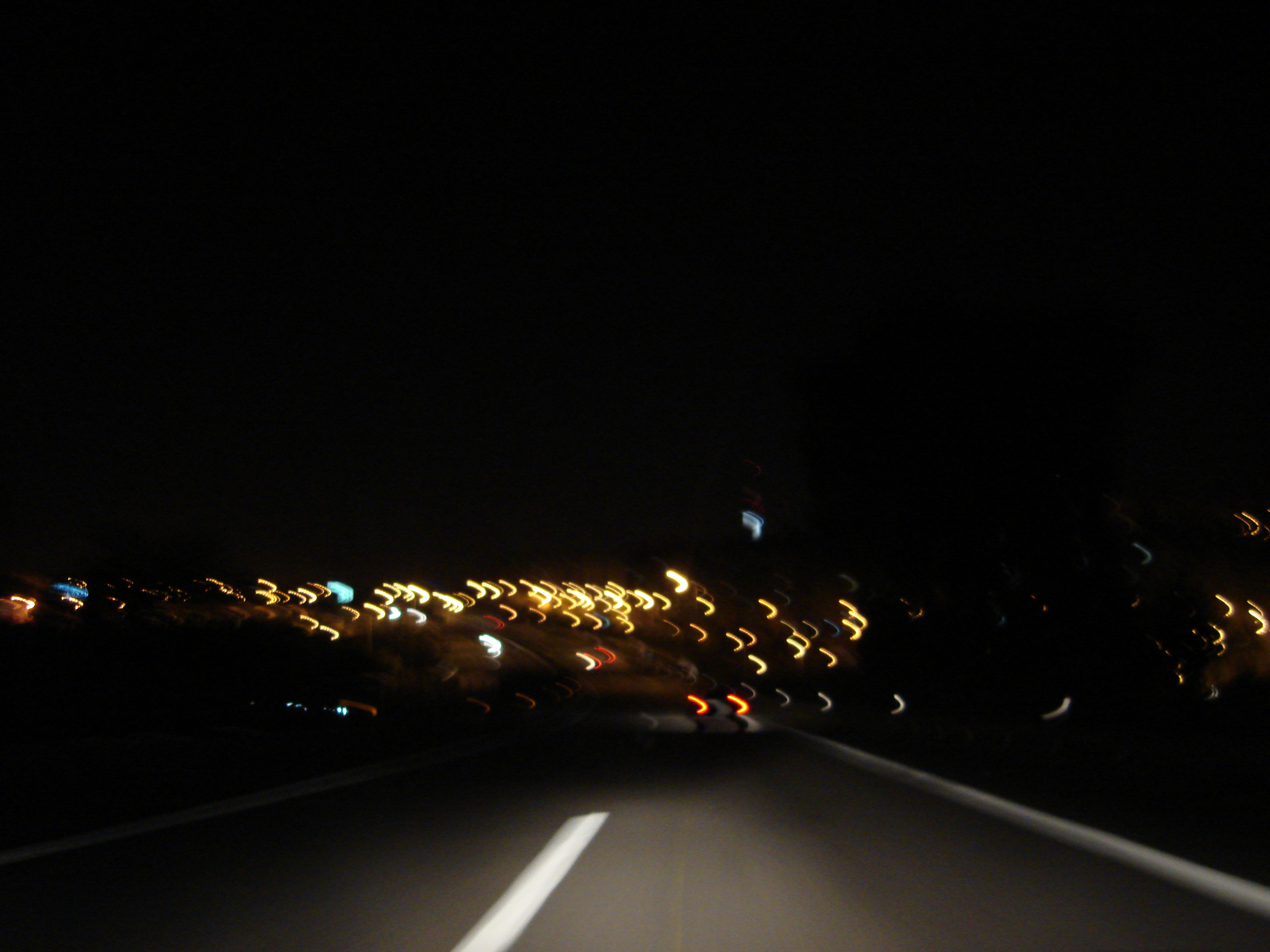 Driving fast at night photo