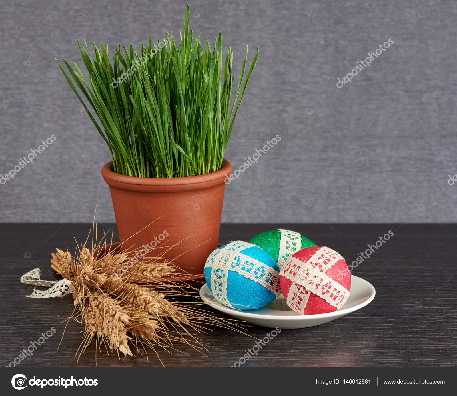 easter eggs in saucer and green wheat — Stock Photo ...