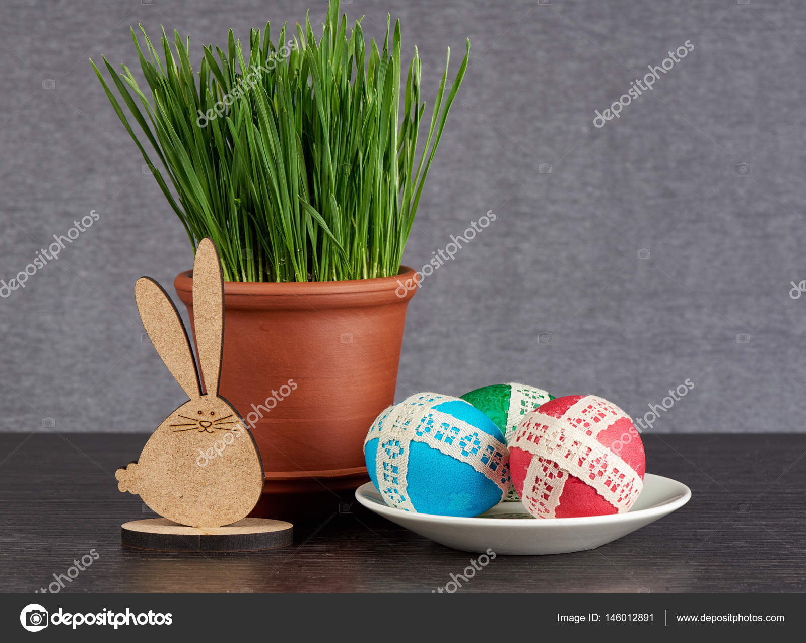 easter eggs in saucer and green wheat — Stock Photo ...