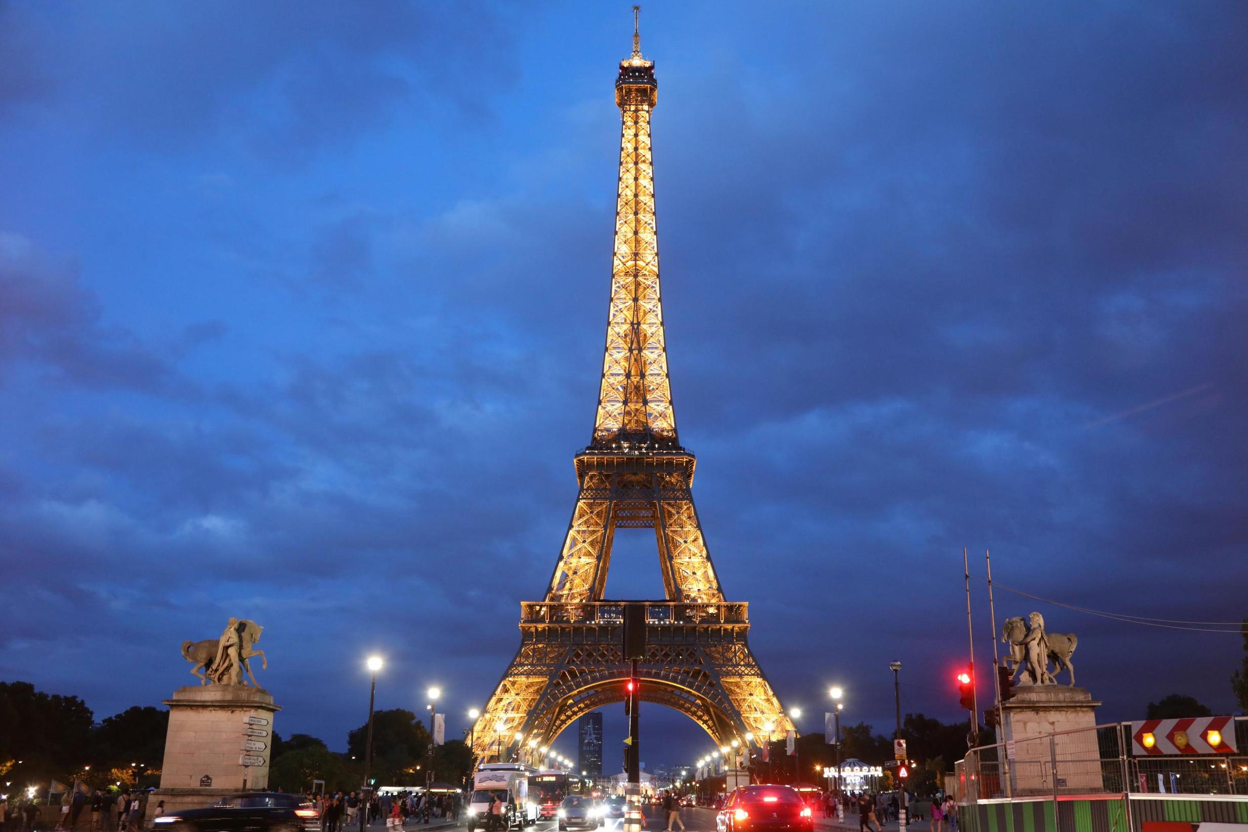 Eiffel Tower on 'lockdown' as Paris tourists report being trapped in ...
