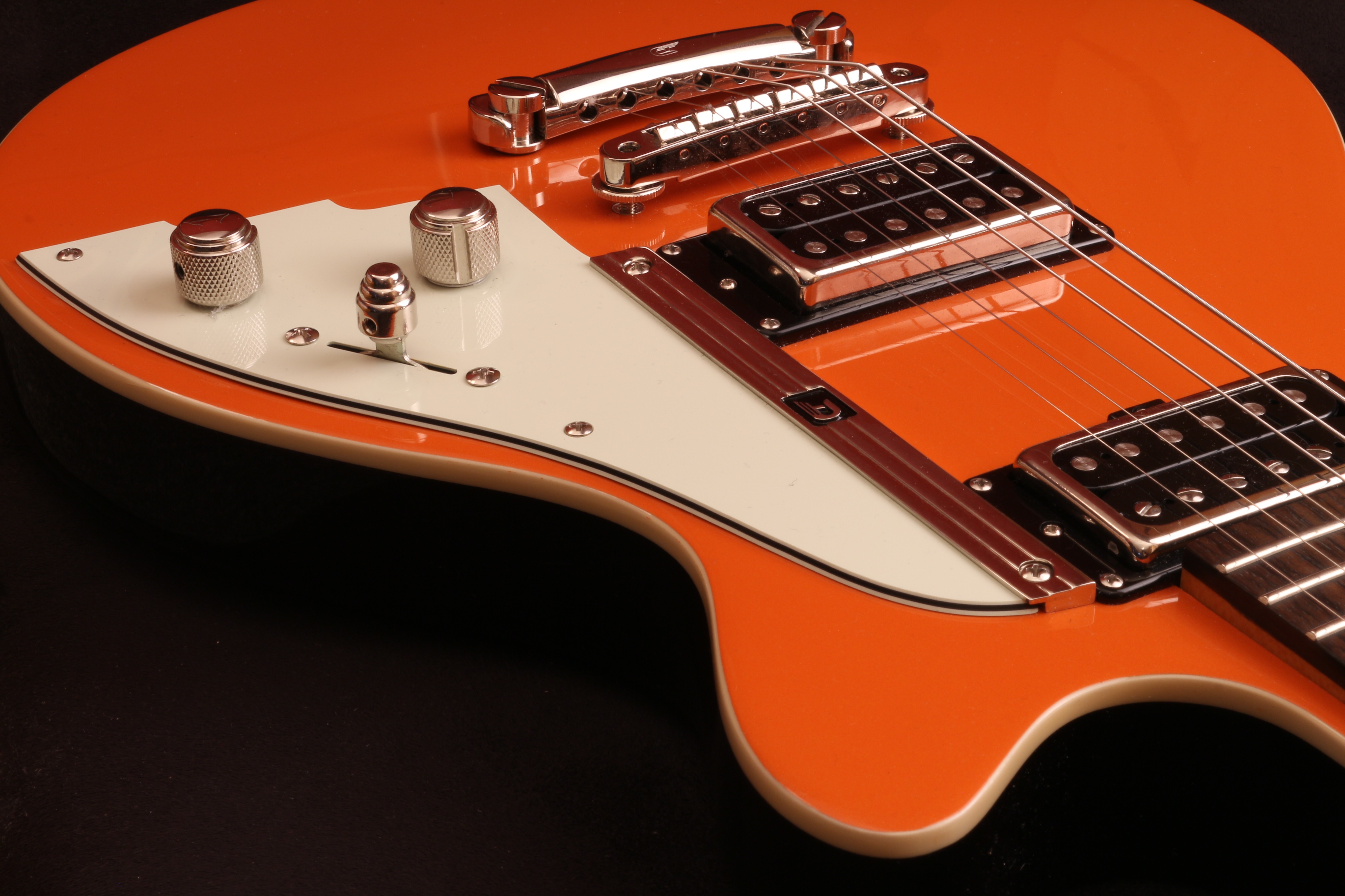 Close-up music orange guitars chrome electric guitars Duesenberg ...
