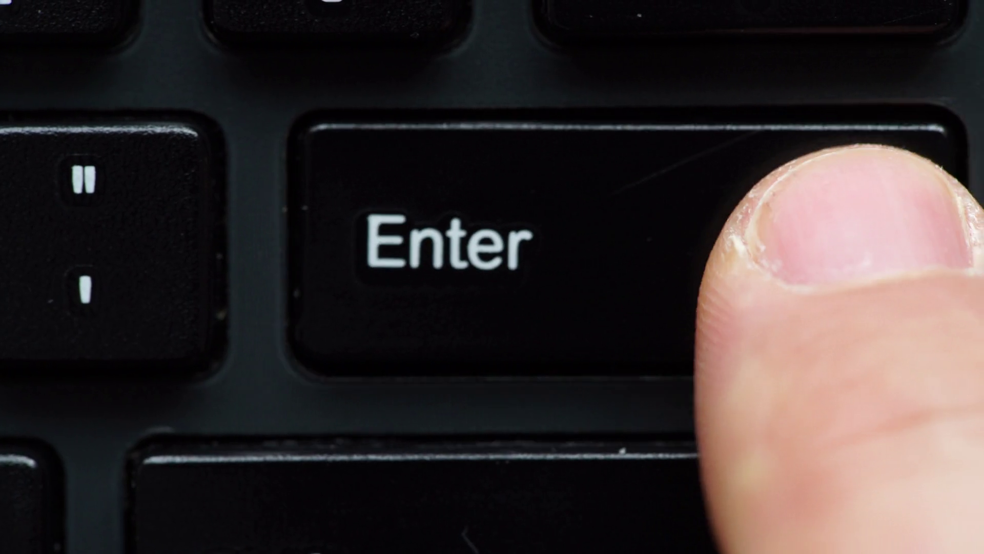 Male finger pressing pushing enter button key. Black computer ...