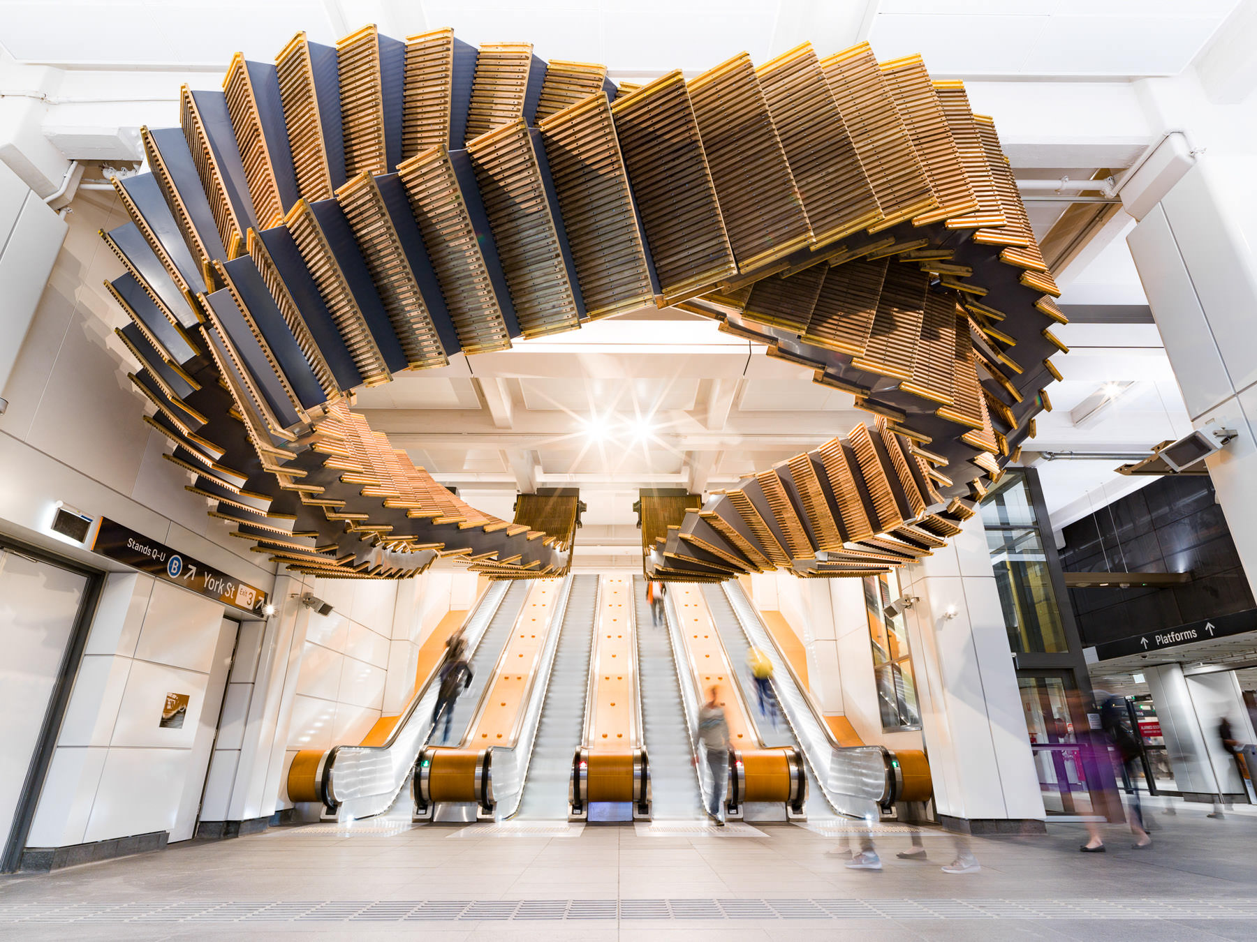 80-Year-Old Wooden Escalators are Repurposed as a Sculptural Ribbon ...
