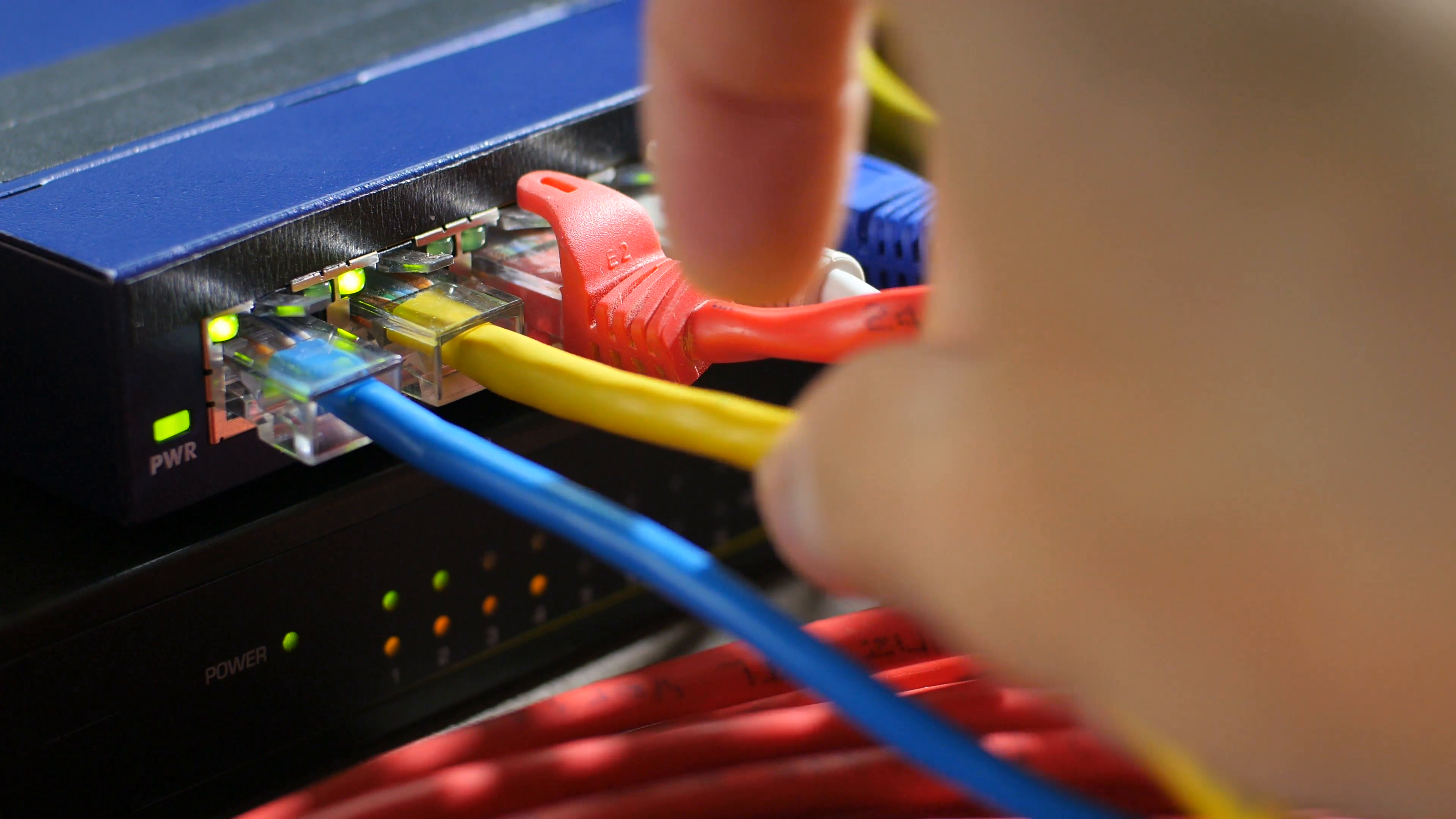 Ethernet cable being plugged into router, close up Stock Video ...