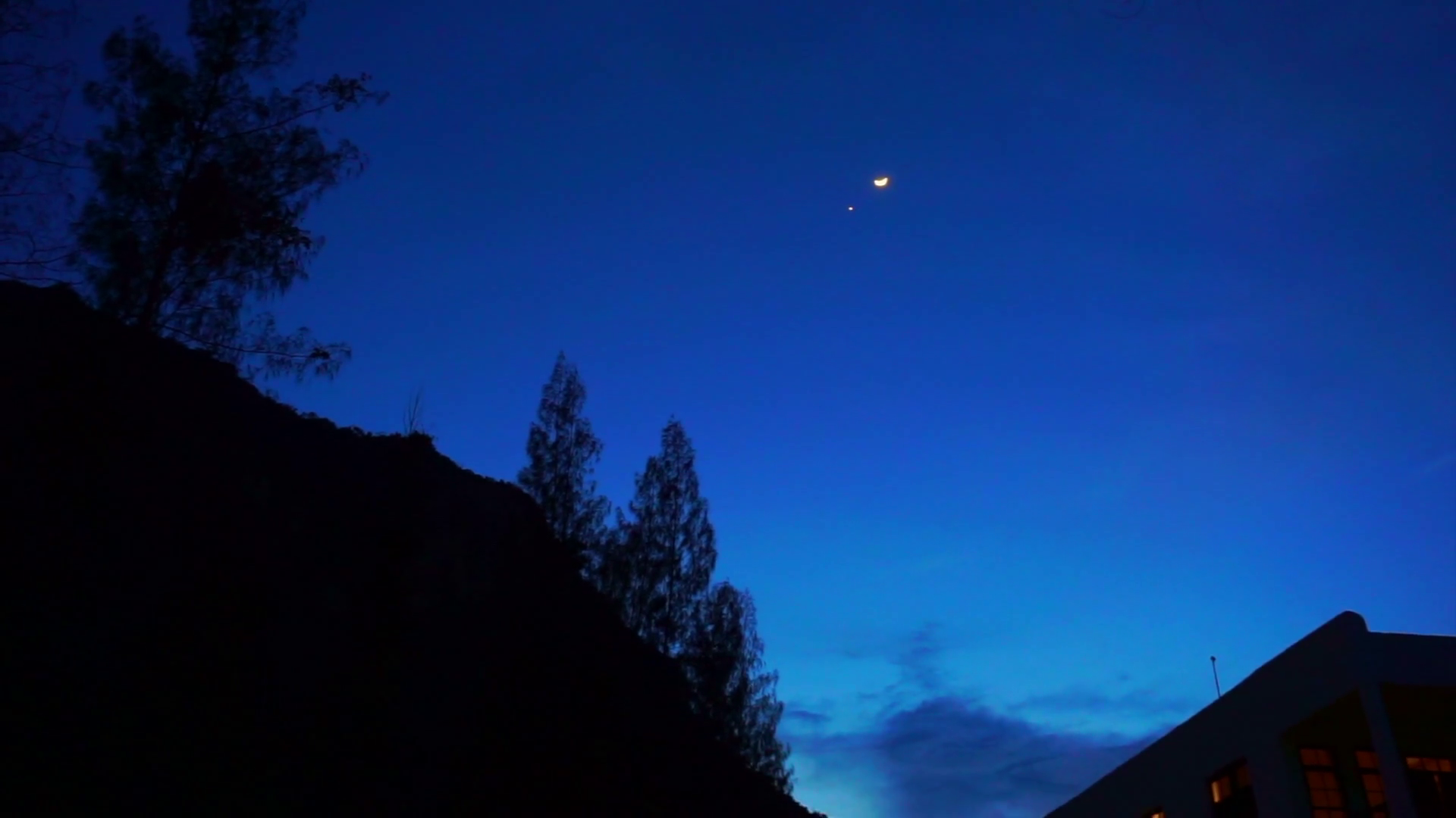 Beautiful evening scene, dark blue sky with silhouette of mountain ...