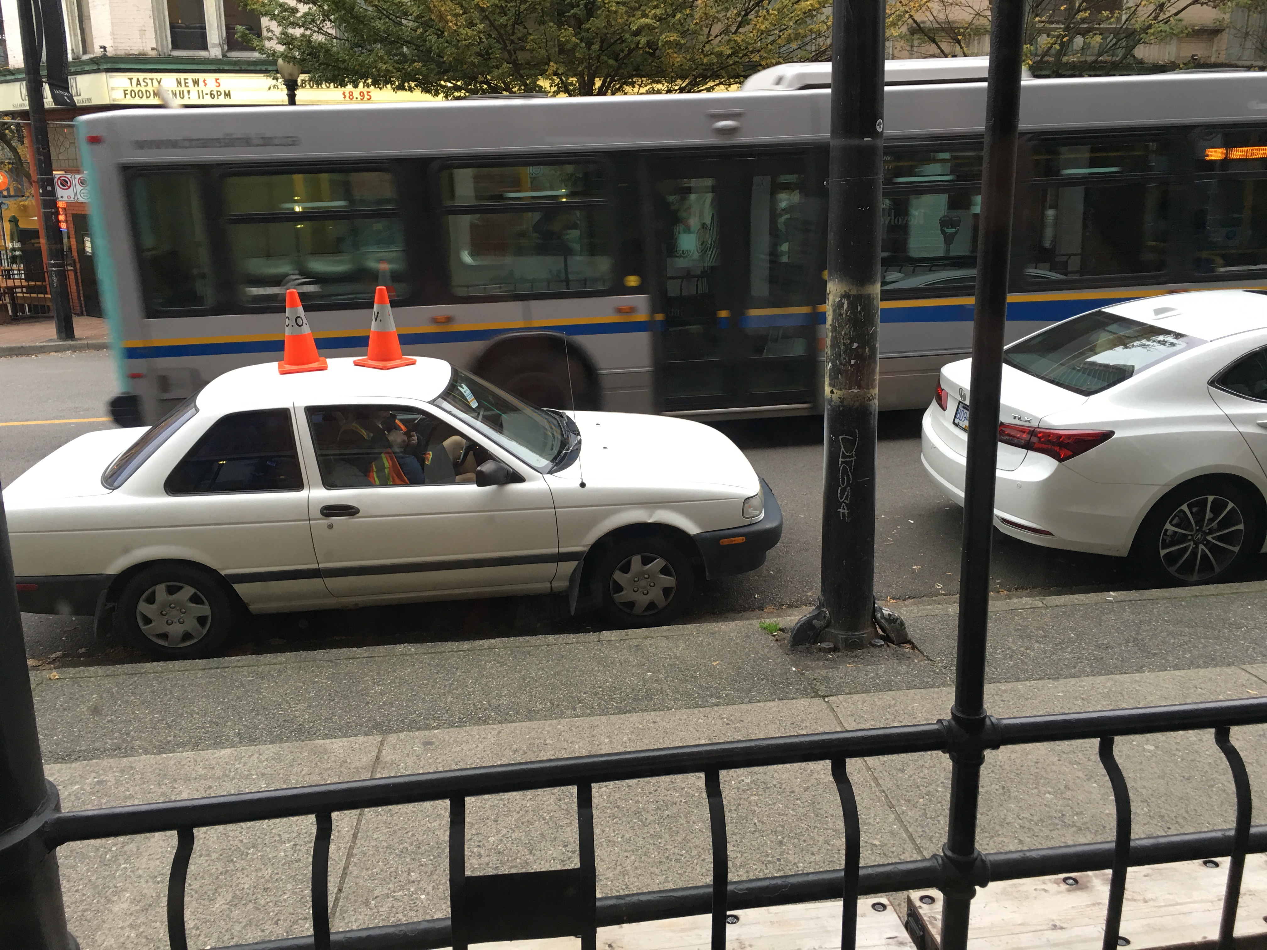 Ever think that guy with the cones on his car is undercover? photo