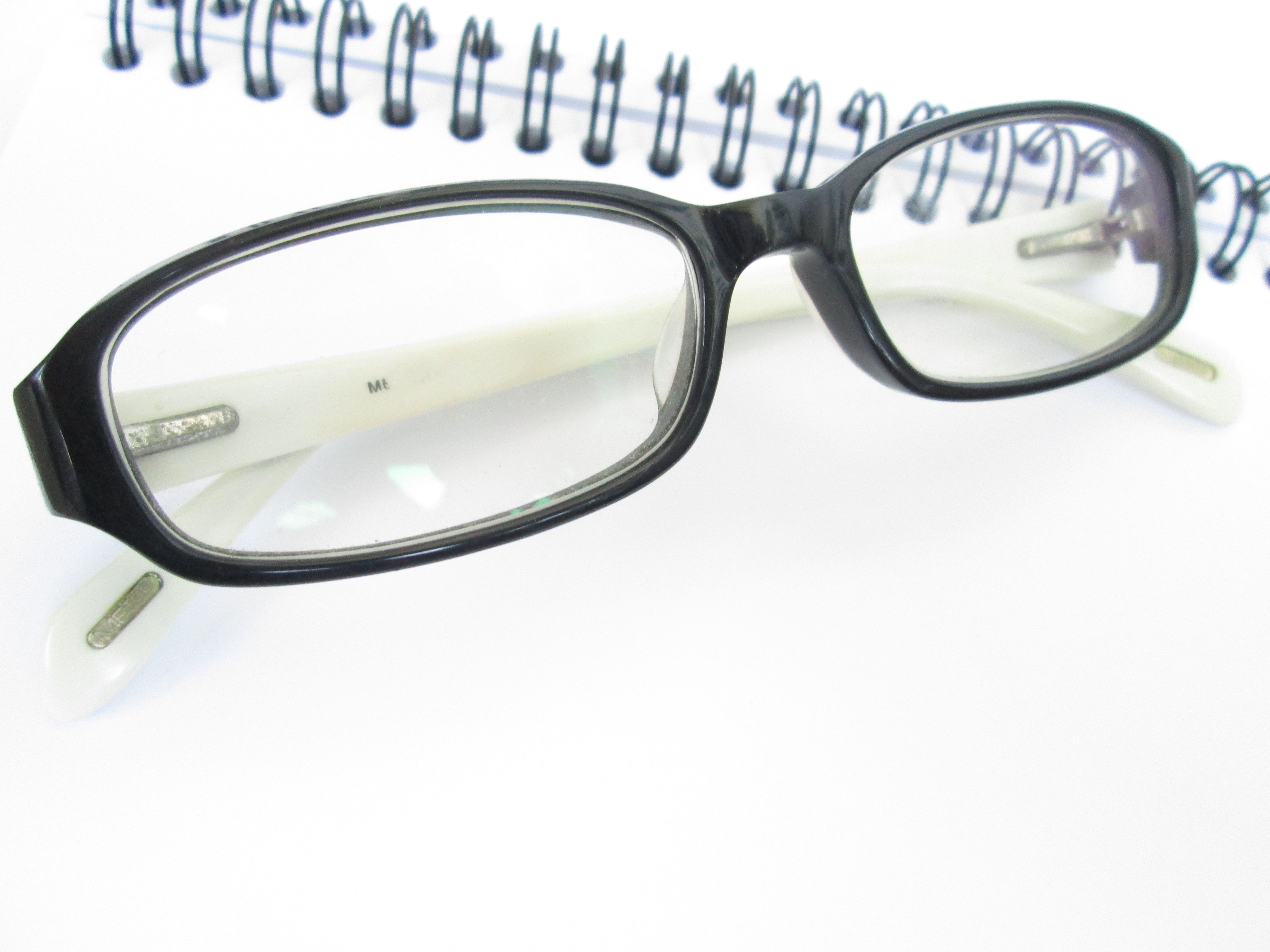Eye glasses with book photo
