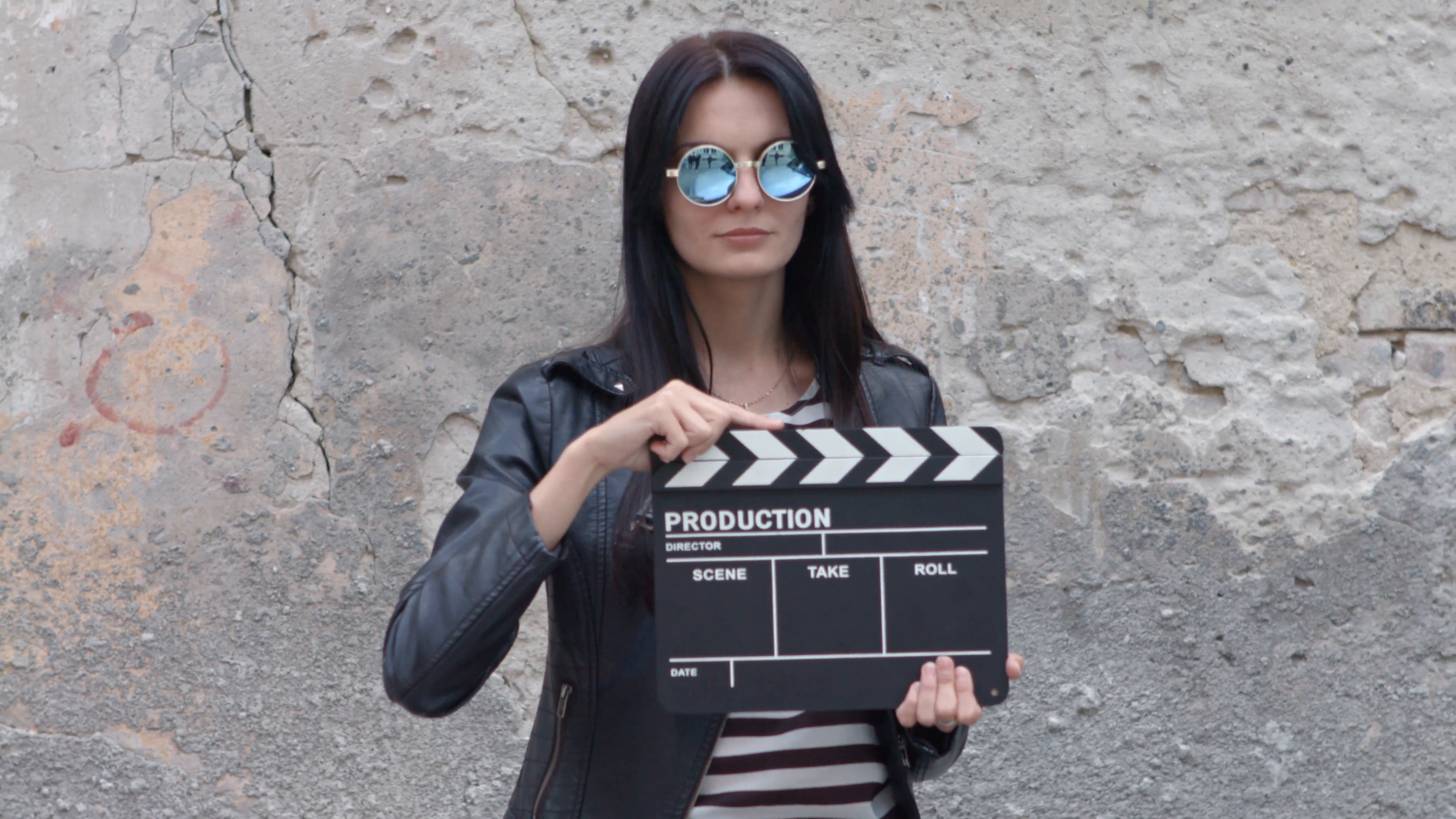Fashionable girl with clapboard Stock Video Footage - VideoBlocks