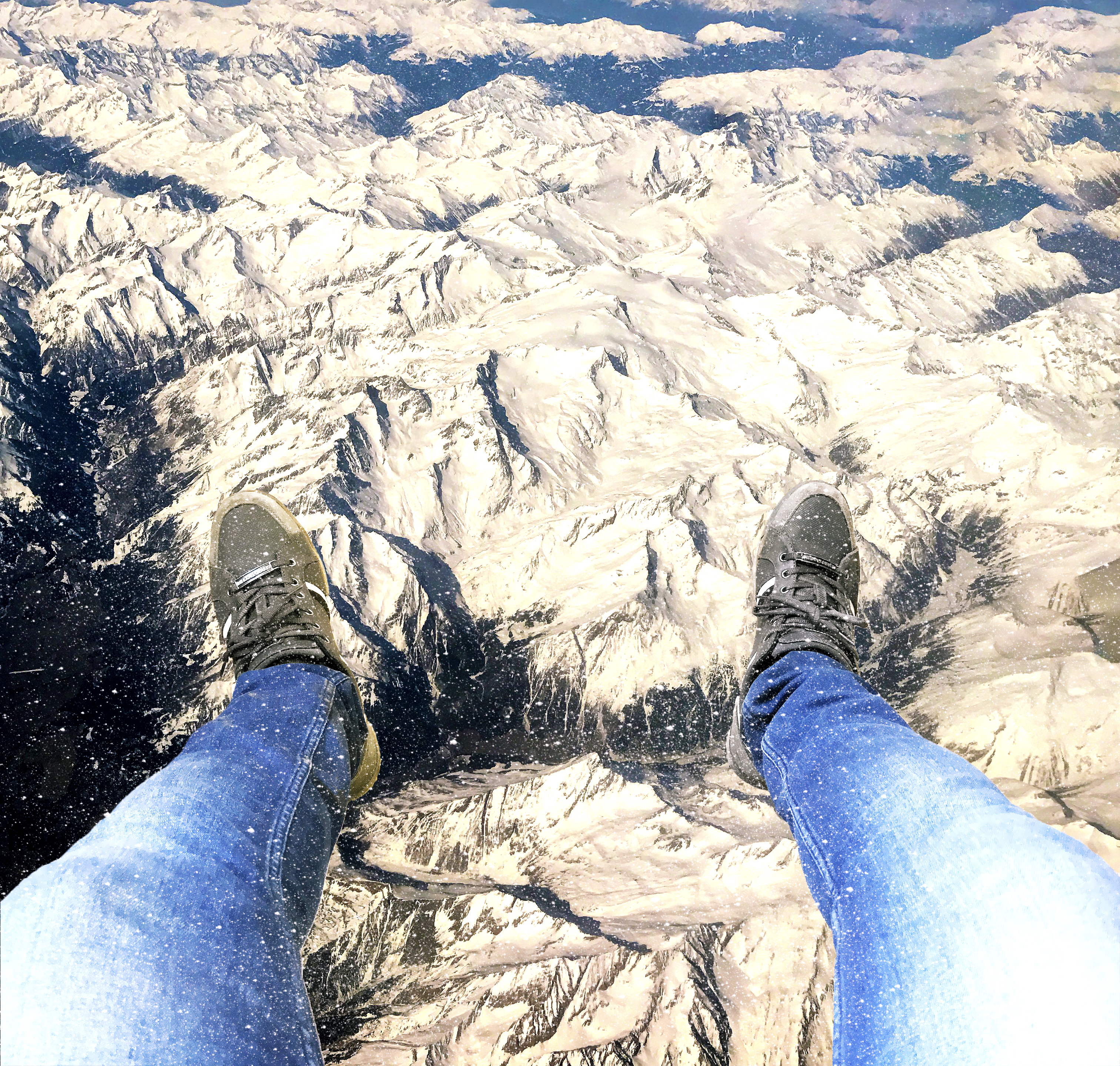 Feet hanging over the alps photo