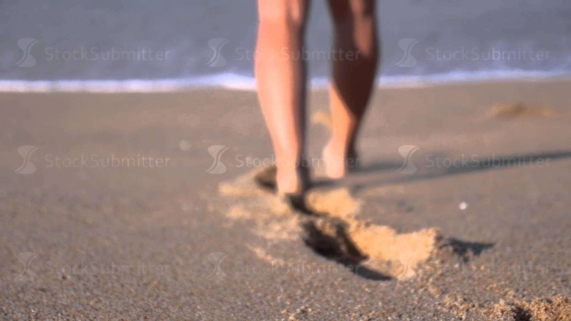 Woman Feet Walking on Beach Leaving Footprints in Sand - YouTube