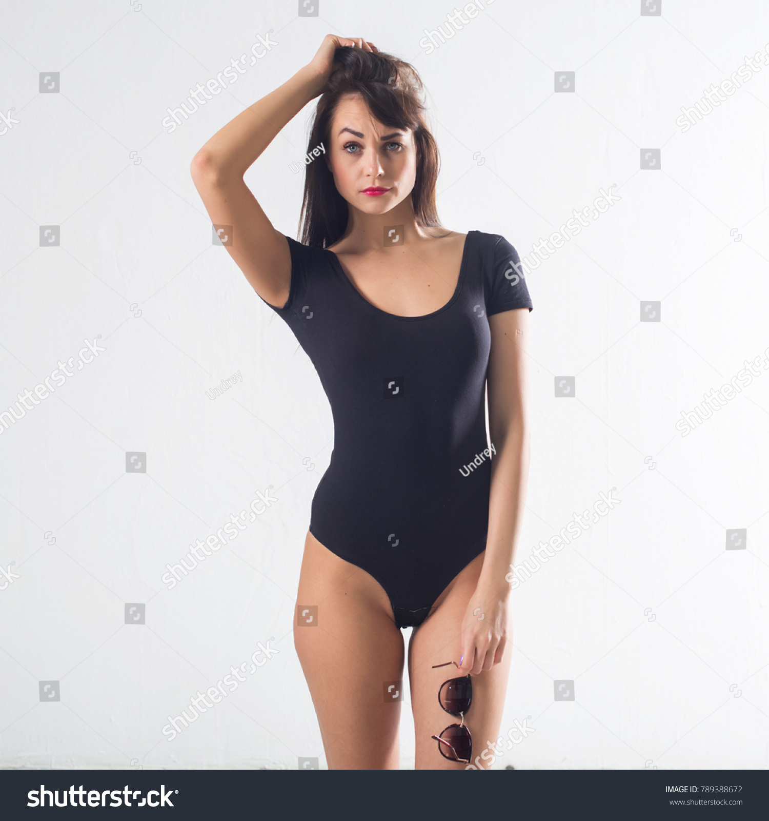 Cute Brunette Female Model Posing Wearing Stock Photo (100% Legal ...
