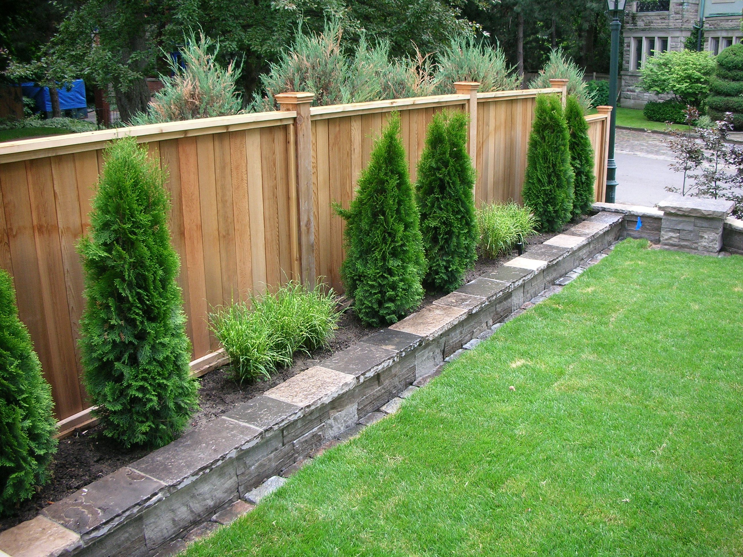 backyard fencing | privacy fence fence sod irrigation system stone ...