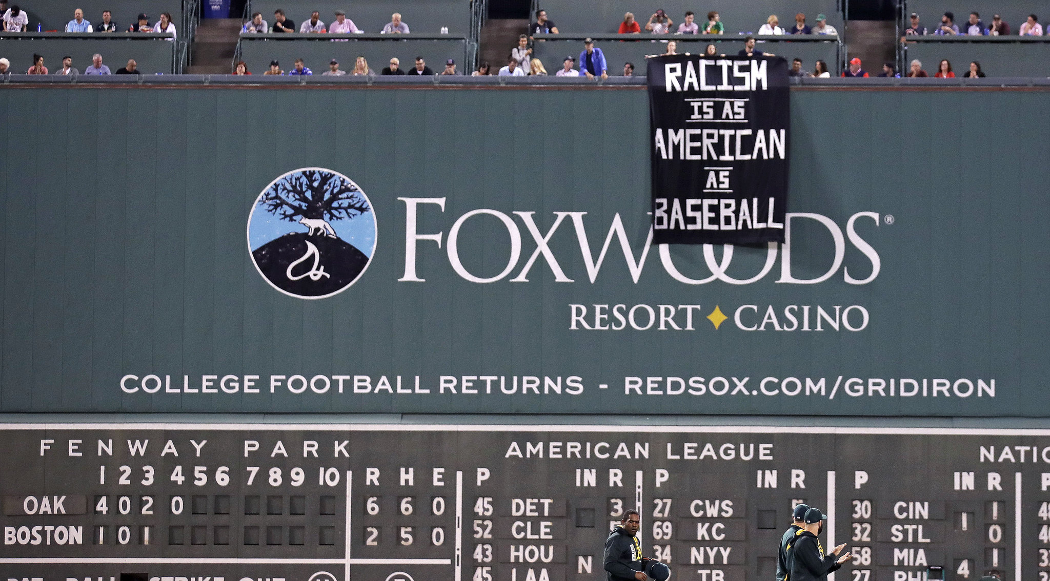 Racism is as American as baseball' banner dropped from Green Monster ...