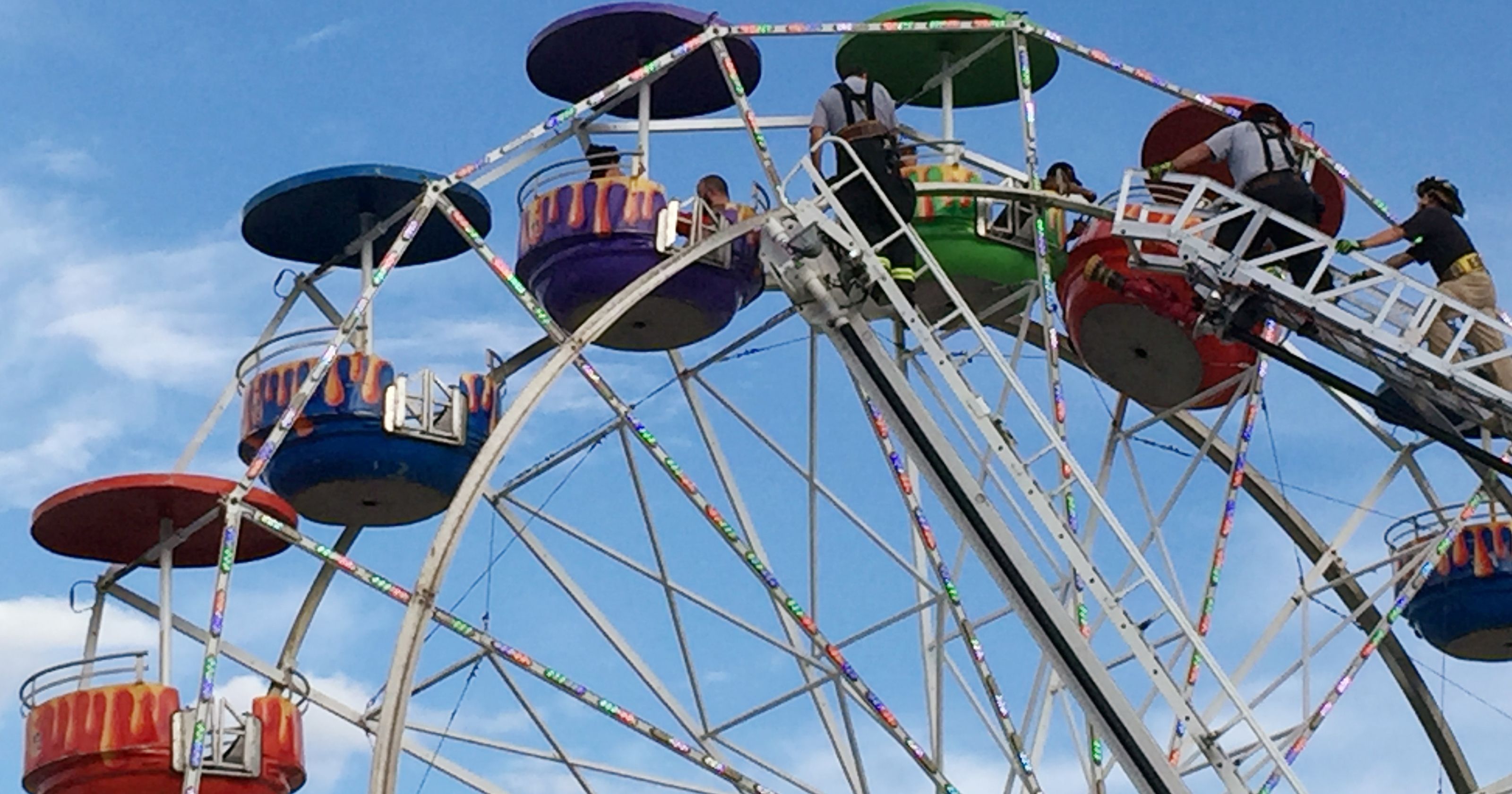 1 girl critically injured in fall from fair's Ferris wheel