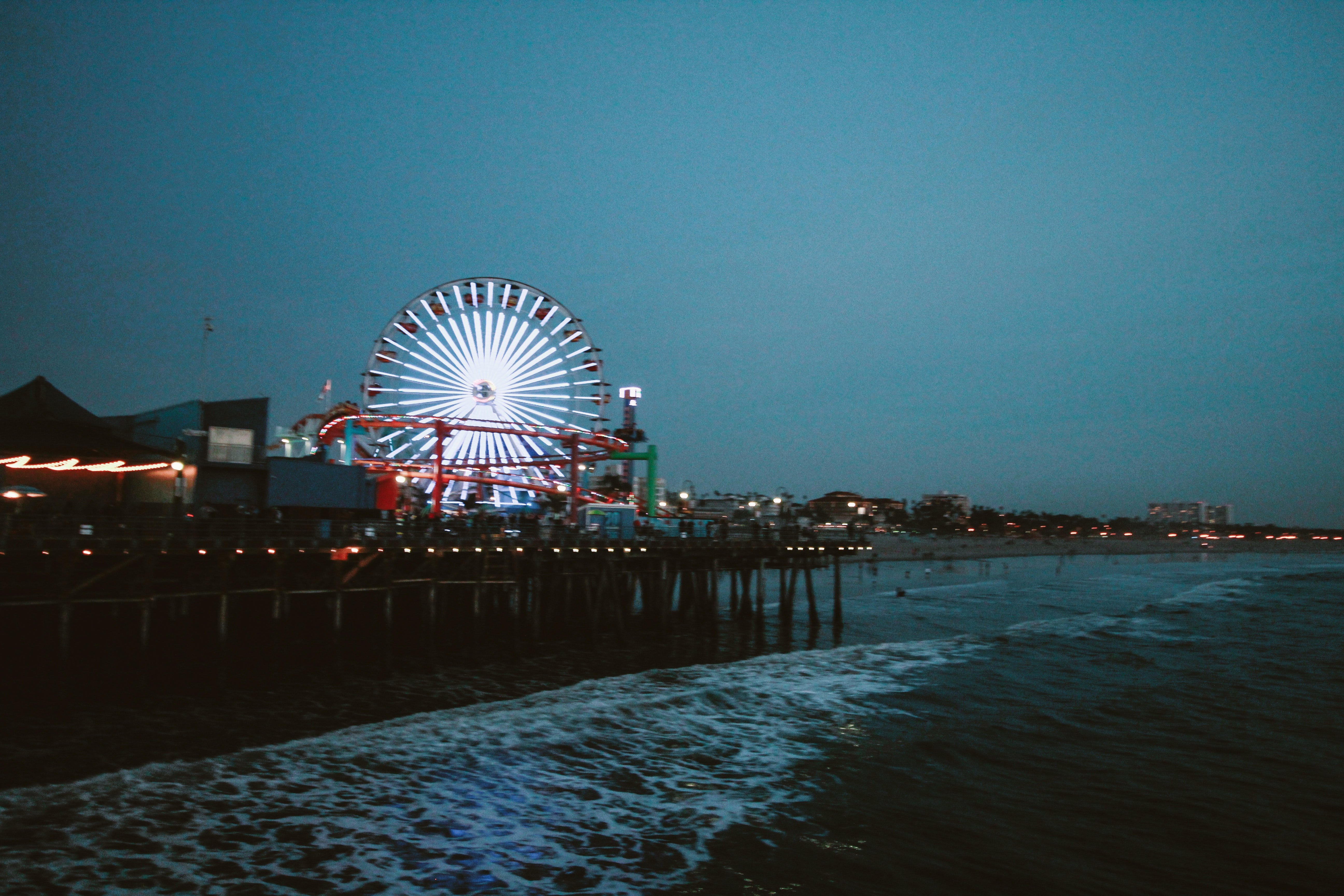 Ferris wheel lit during night time photo