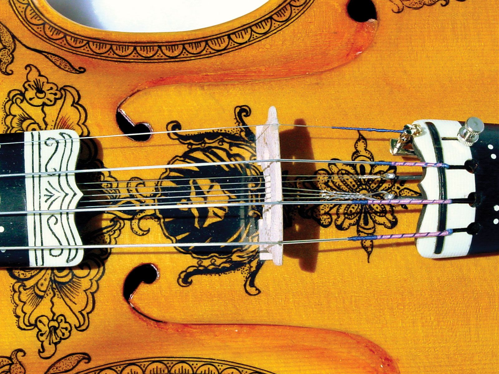 Typically ornate Hardanger fiddle (detail), a Norwegian folk ...