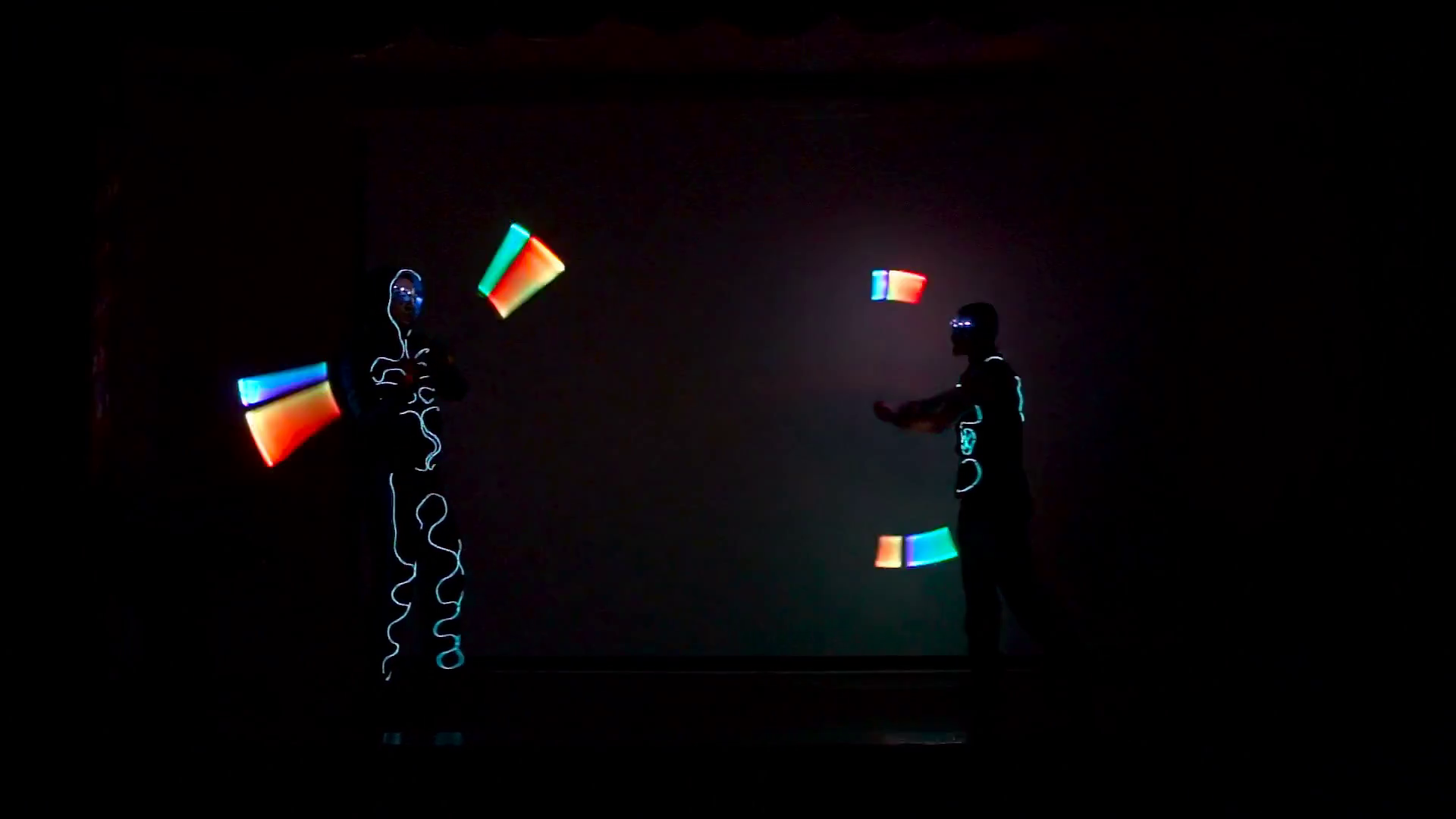 Men twist fiery circles on a LED show. Stock Video Footage - VideoBlocks