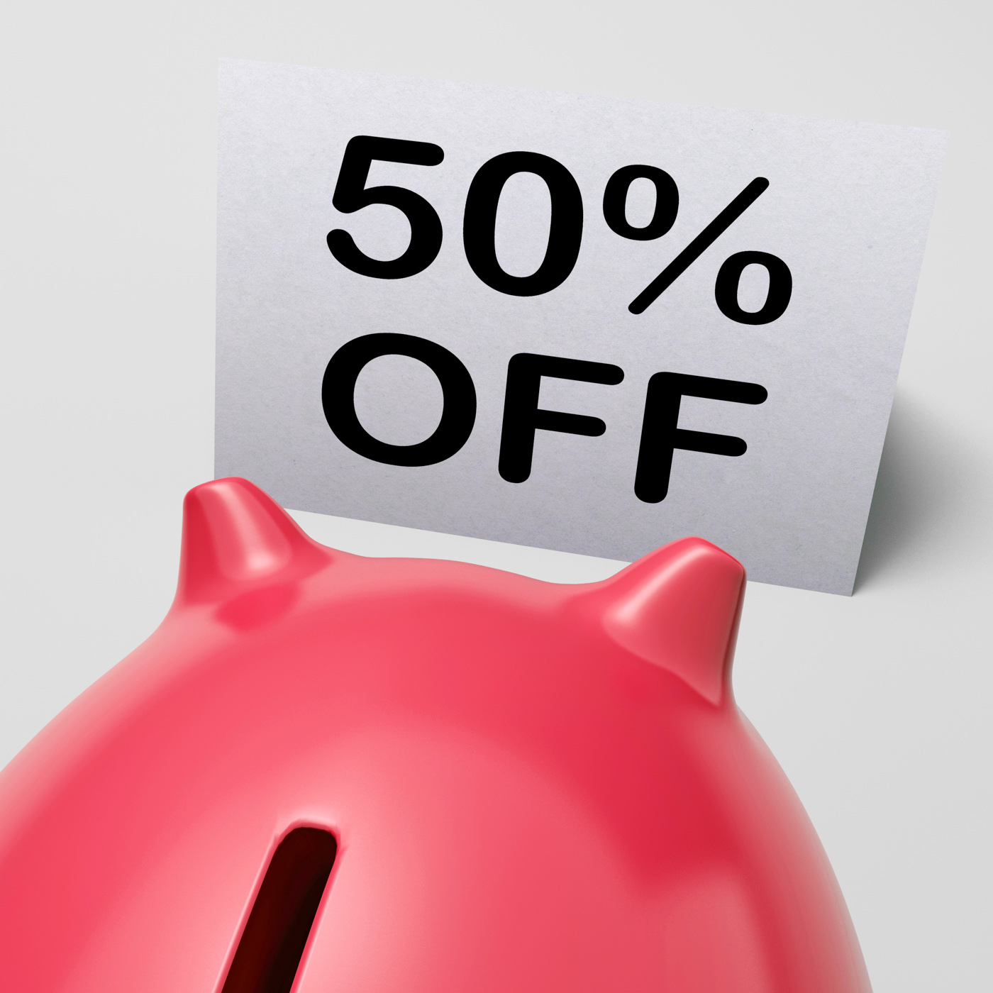 Fifty percent off piggy bank shows 50 half-price promotion photo