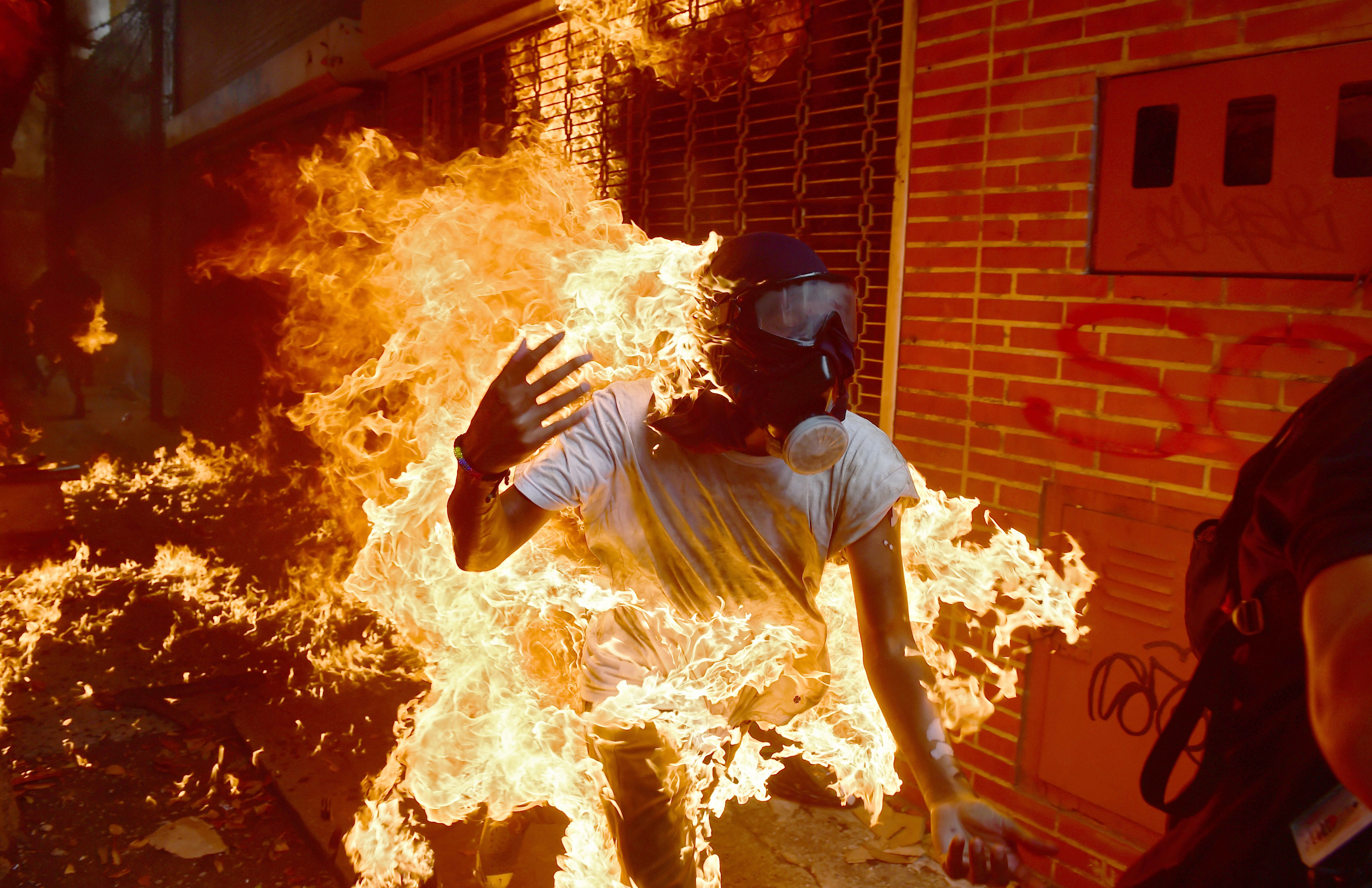 World Press Photo: Photograph of a man on fire wins top photo prize ...