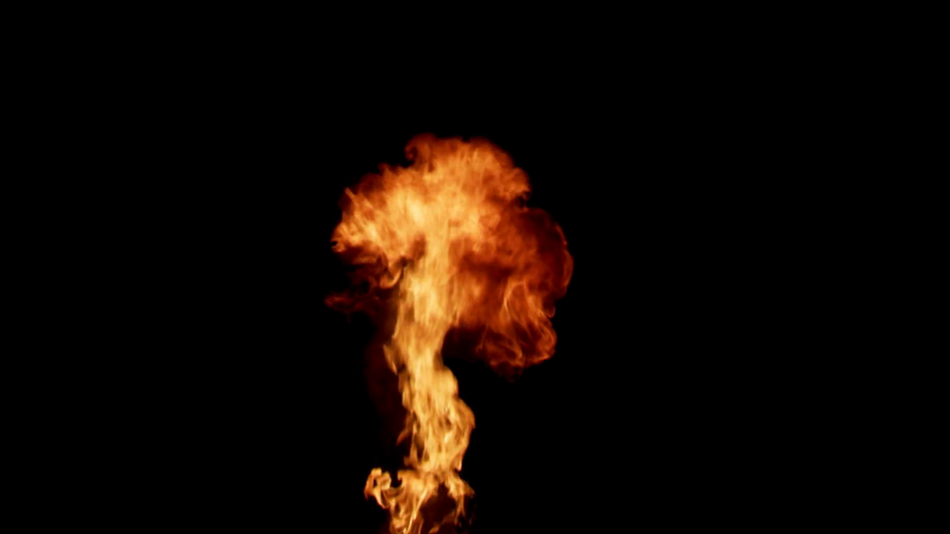 Ball of fire descending on black background Motion Background ...