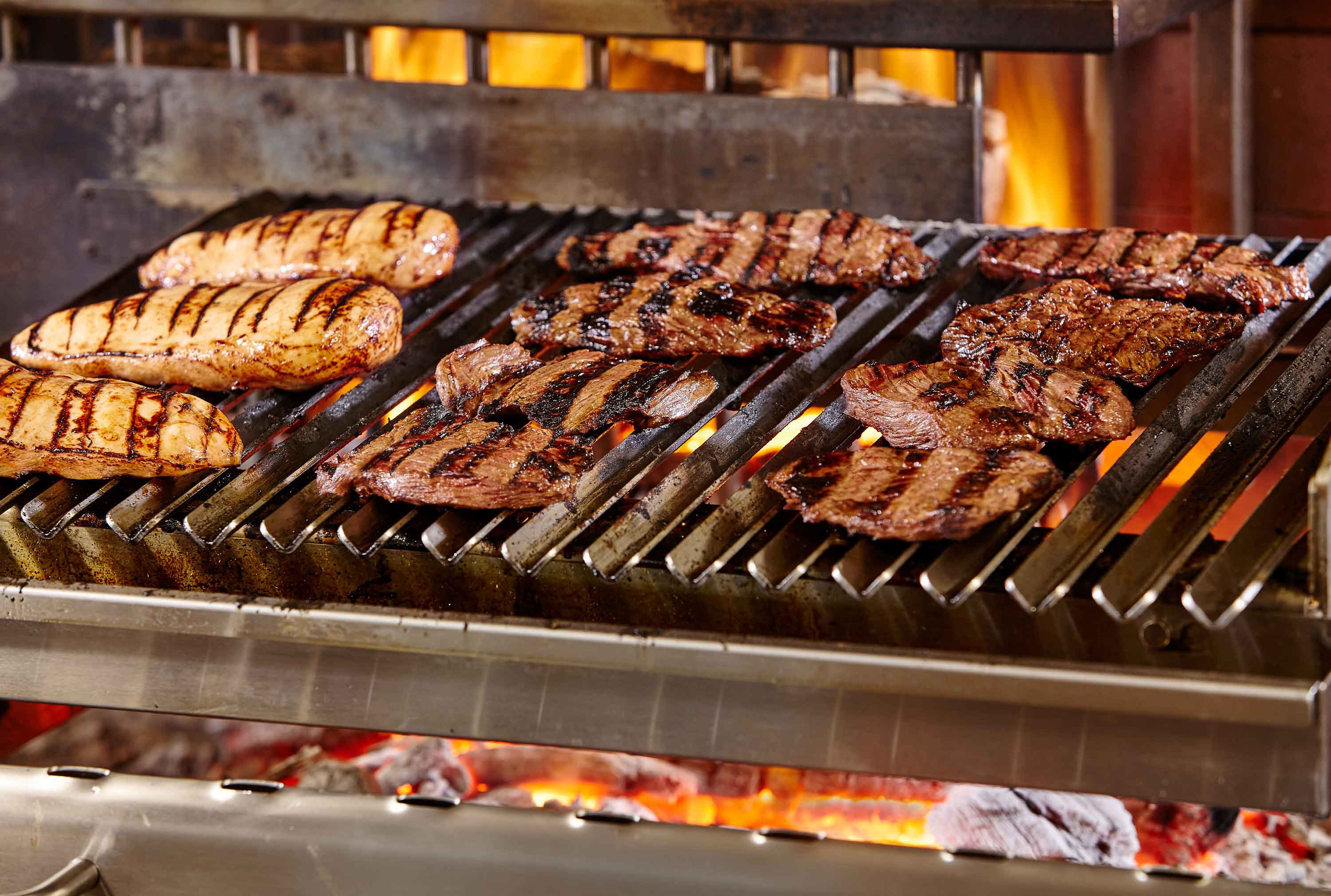 Huti's 5 Free-Fire Grill | Located in The Woodlands, Texas