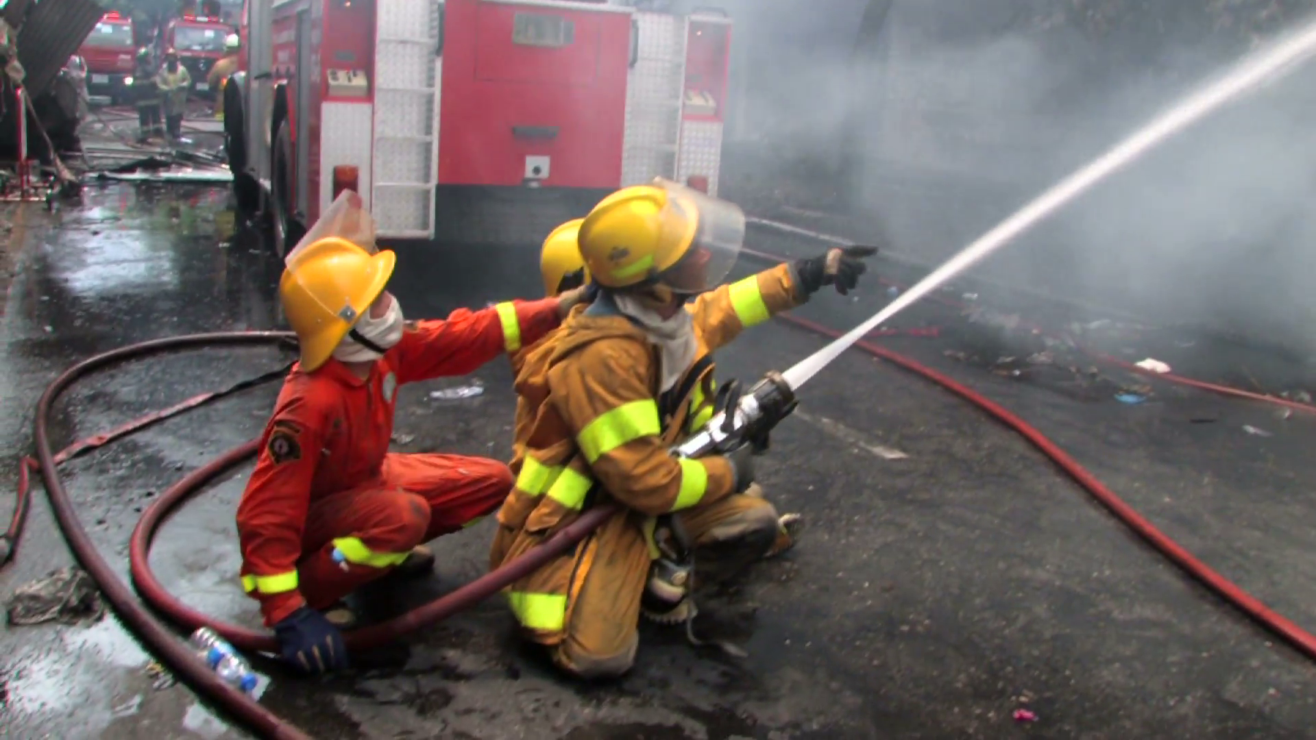 Firefighters Use Water Hose FIREMEN BLAZE Fire Burning Building ...