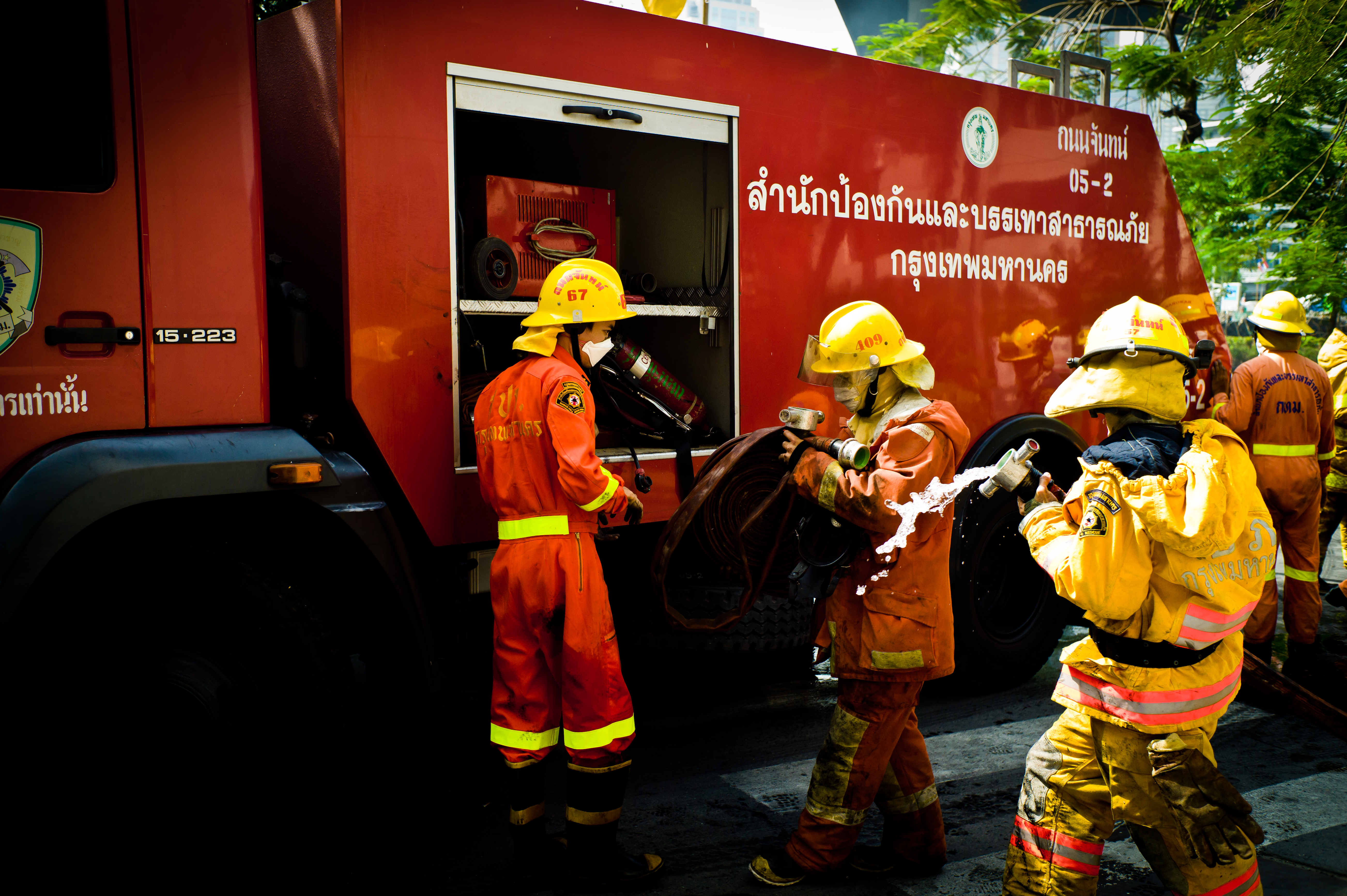 File:Thai fire engine and firefighters during 2010 Thai political ...