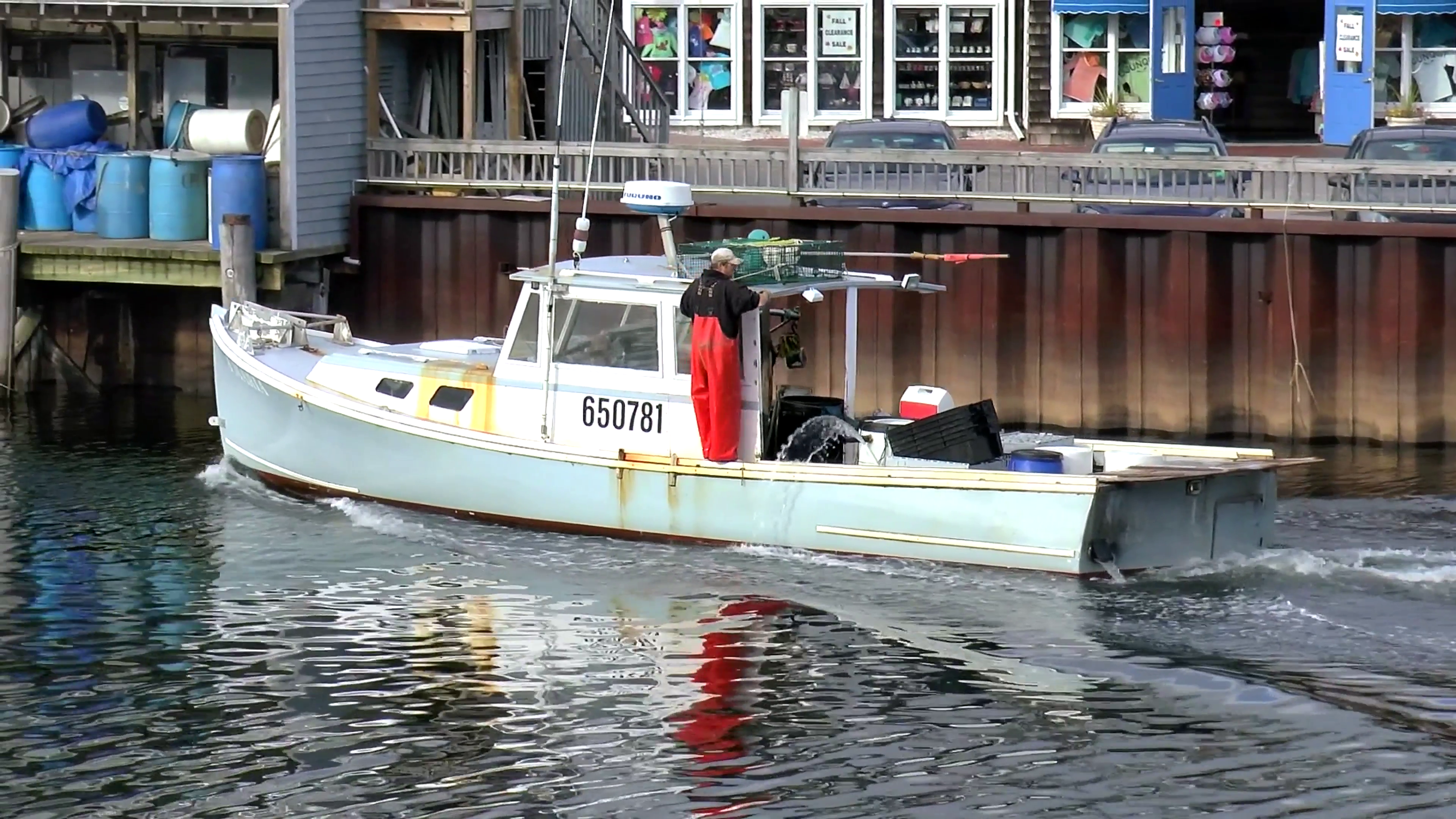 4K Fishing boat returns to pier dock Stock Video Footage - VideoBlocks
