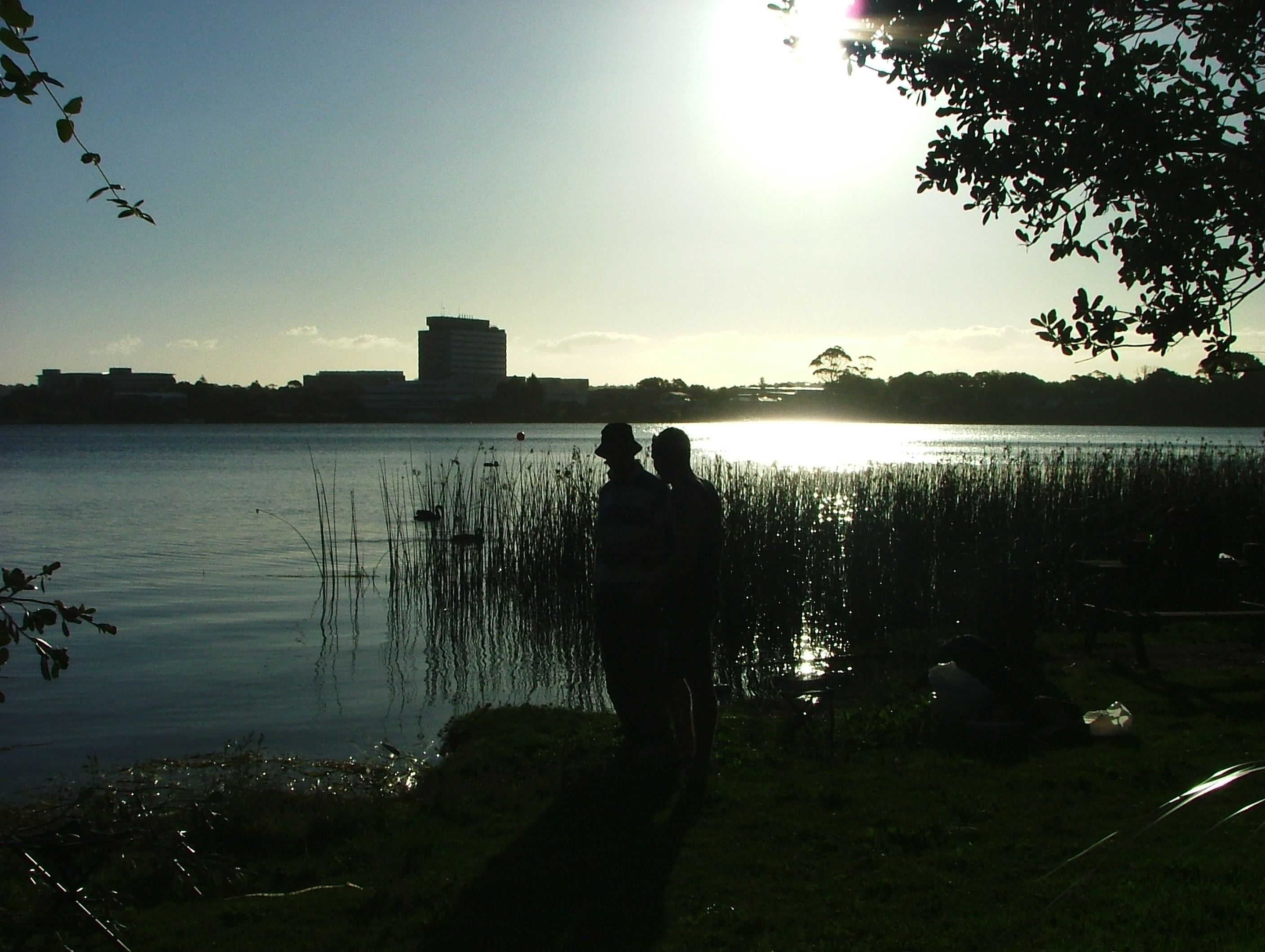 Fishing silhouette lake photo