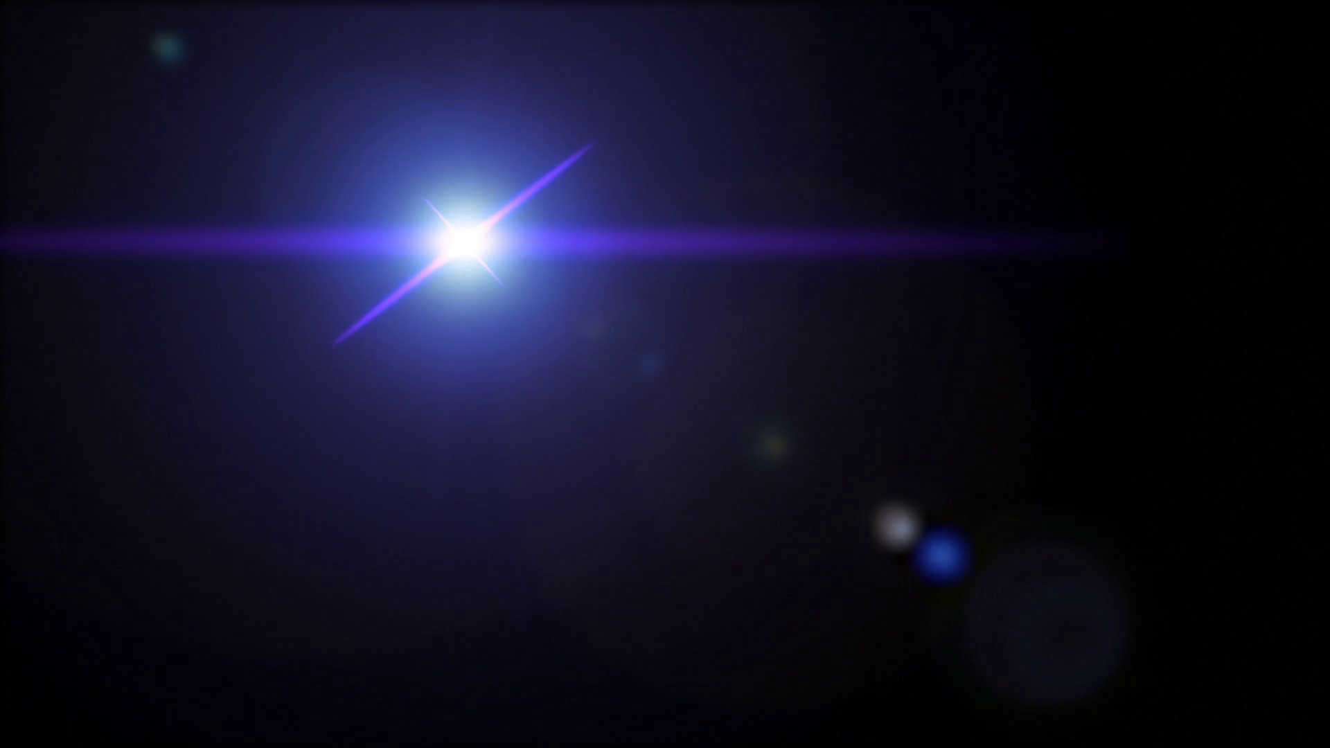 Blue colored lens flare effect animation on black background Motion ...
