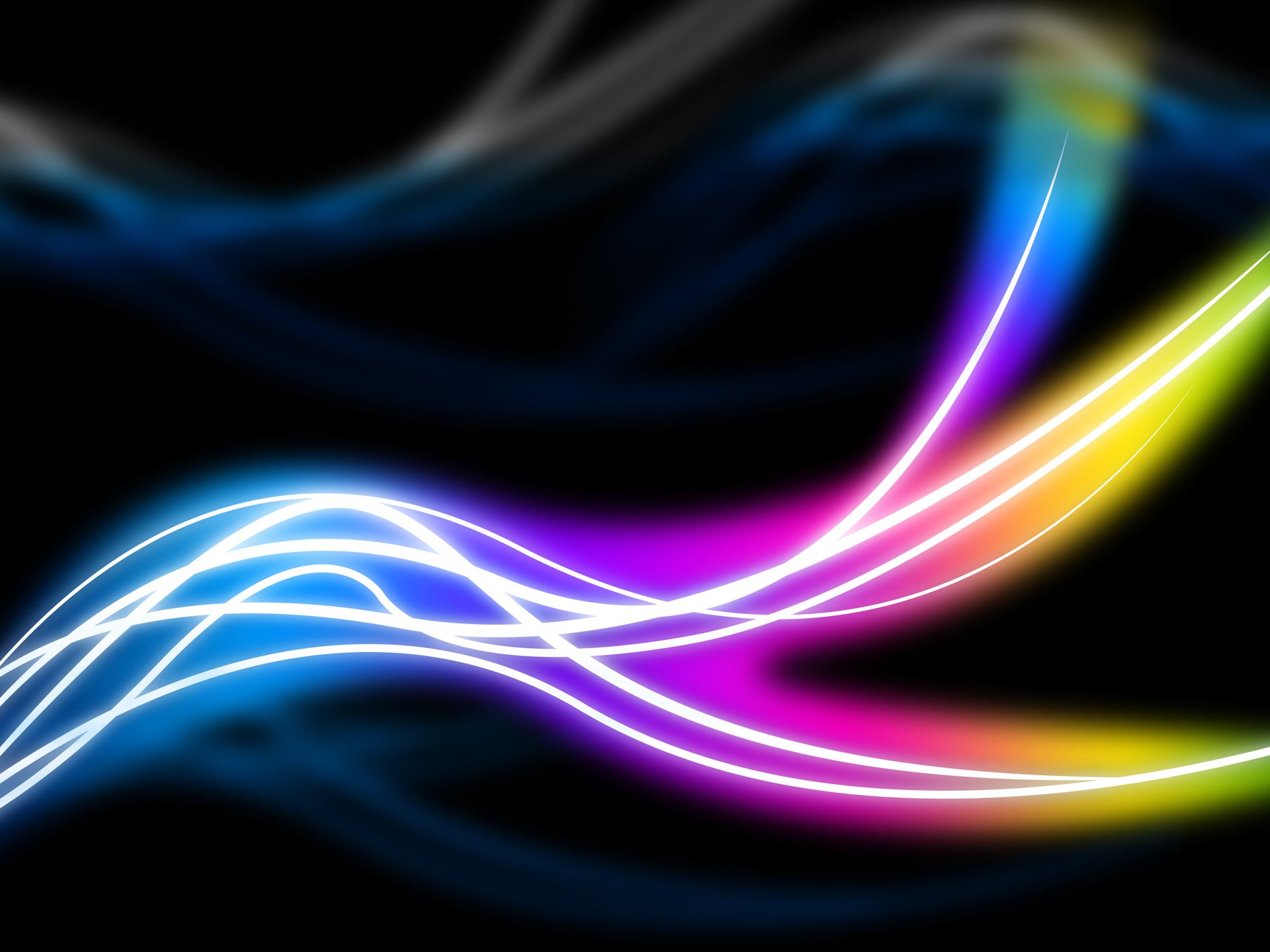 Flourescent swirls background shows colorful pattern in dark photo