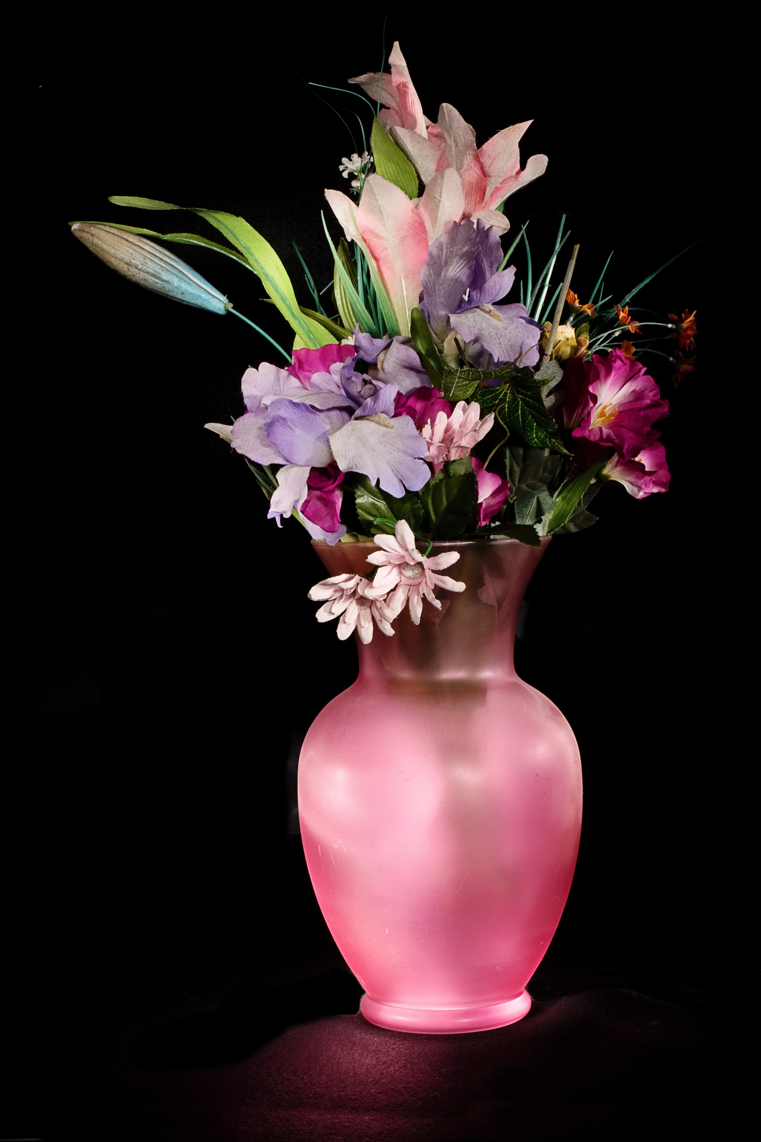 Flowers in pink vase photo