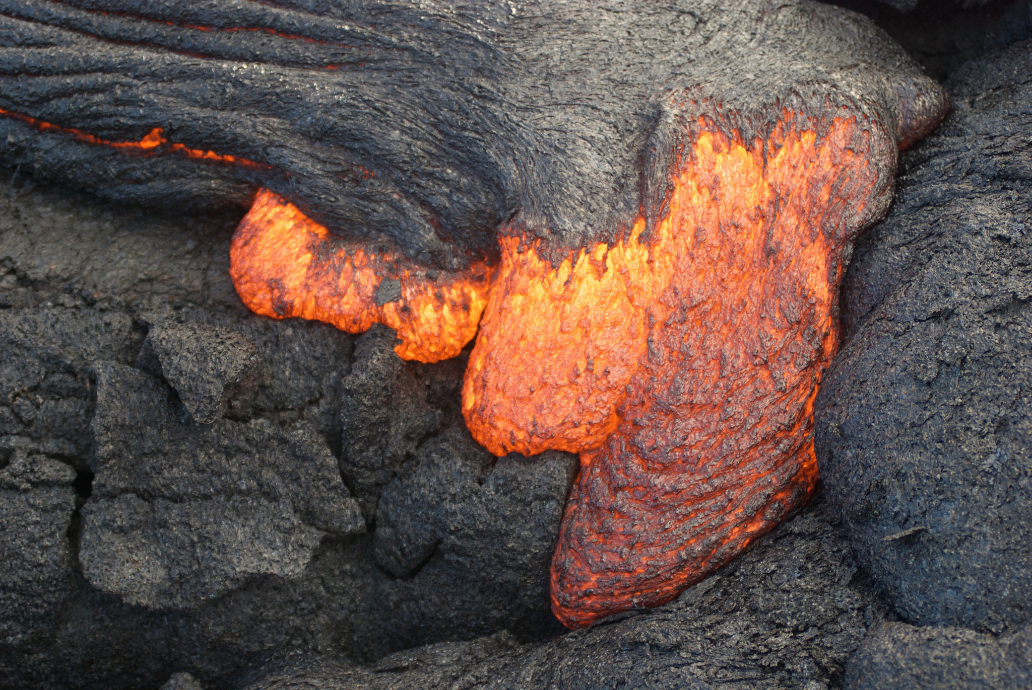 Lava from Hawaii volcano cascades into sea in vivid display ...