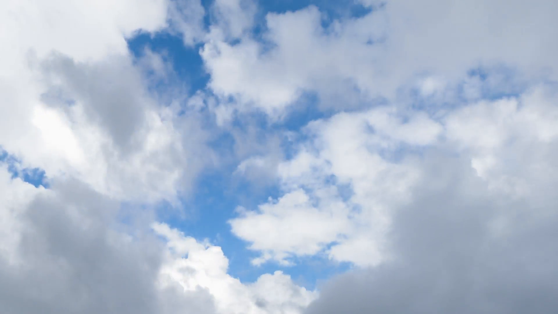 Fast motion timelapse background of fluffy clouds moving on sky at ...