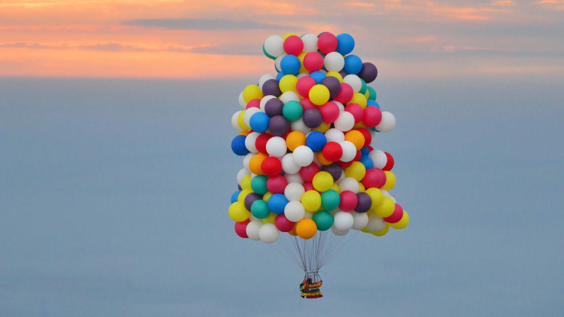 Up, up and away: Man tries flying with just balloons - NBC News