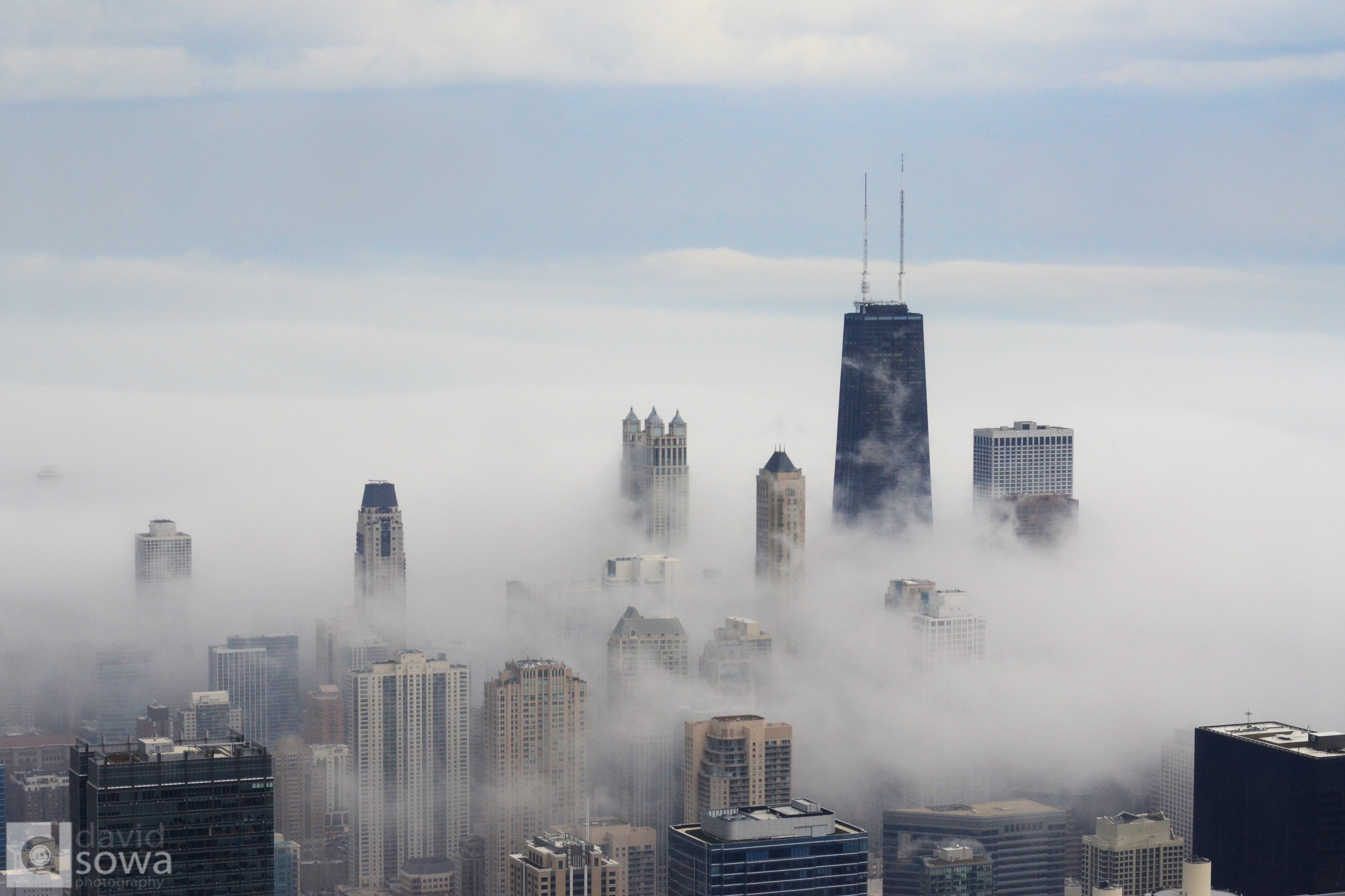 Fog rolling through and blanketing downtown Chicago | David Sowa