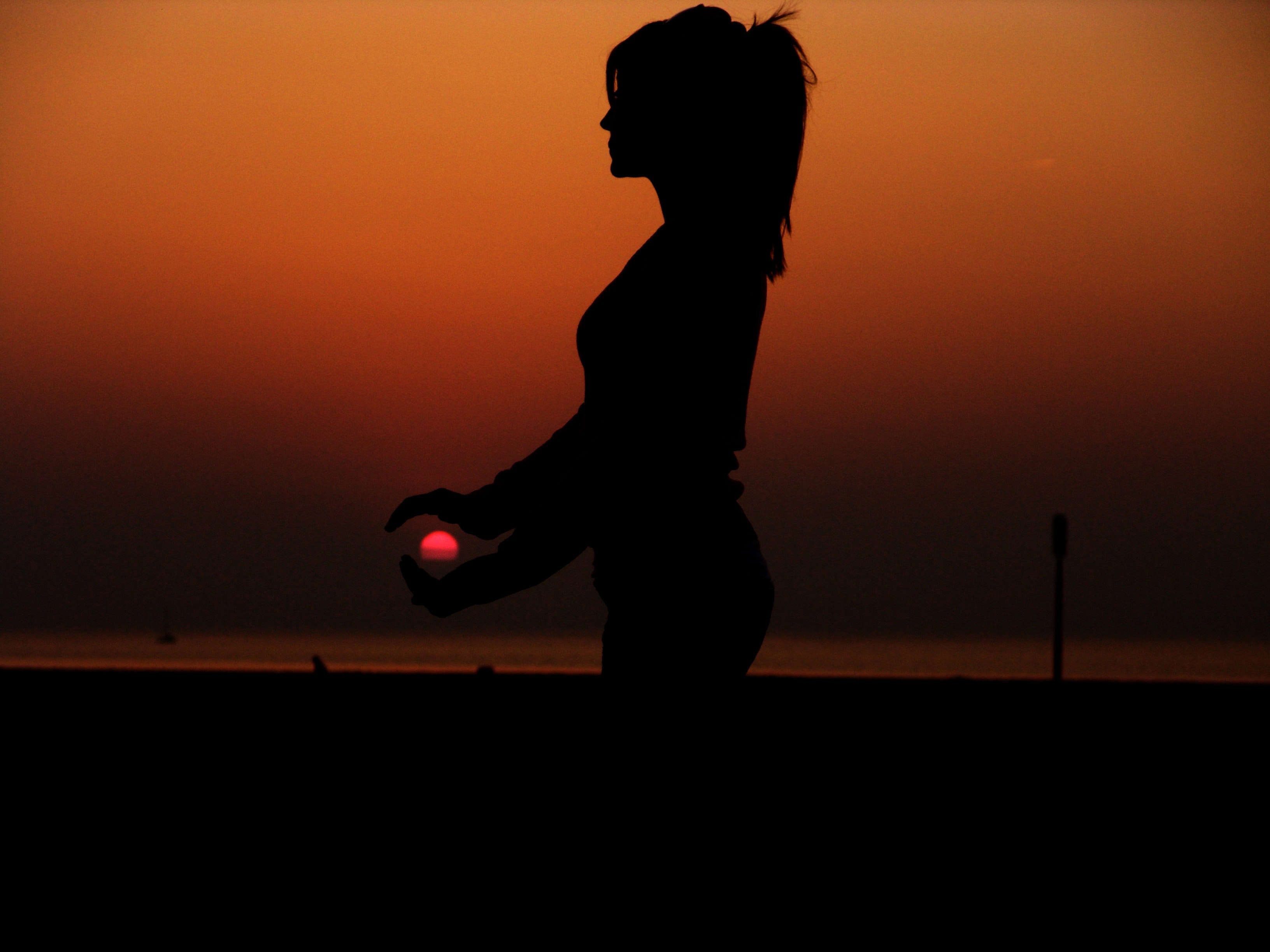 Force Perspective Photography of a Silhouette of a Woman Holding the Sun, Beach, Dawn, Dusk, Female, HQ Photo